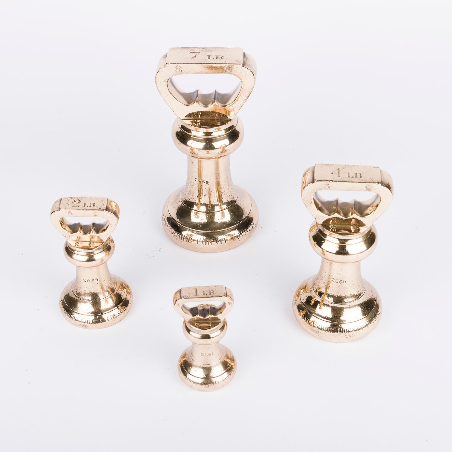A set of bronze imperial standard bell weights by De Grave & Co of London, circa 1900.

4 bell weights: 7, 4, 2 and 1 lbs.

With a case of smaller ounce and dram disc weights. (8, 4, 2, 1, & ½ Ounce, and 4, 2, 1 & ½ Dram).

Indenture number: