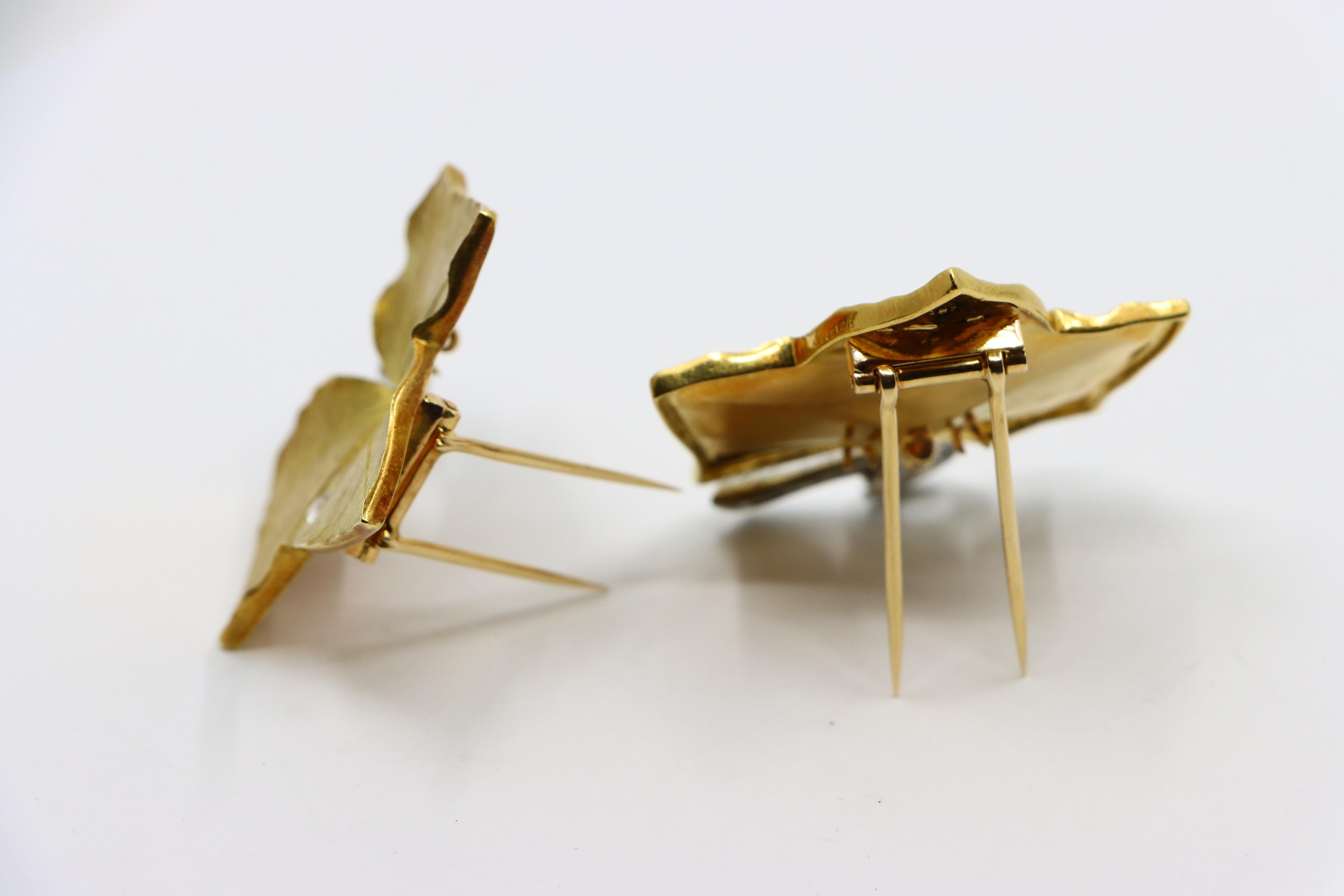 A set of Cartier 18K Gold Platinum Diamond Maple Leaf Clips 6
