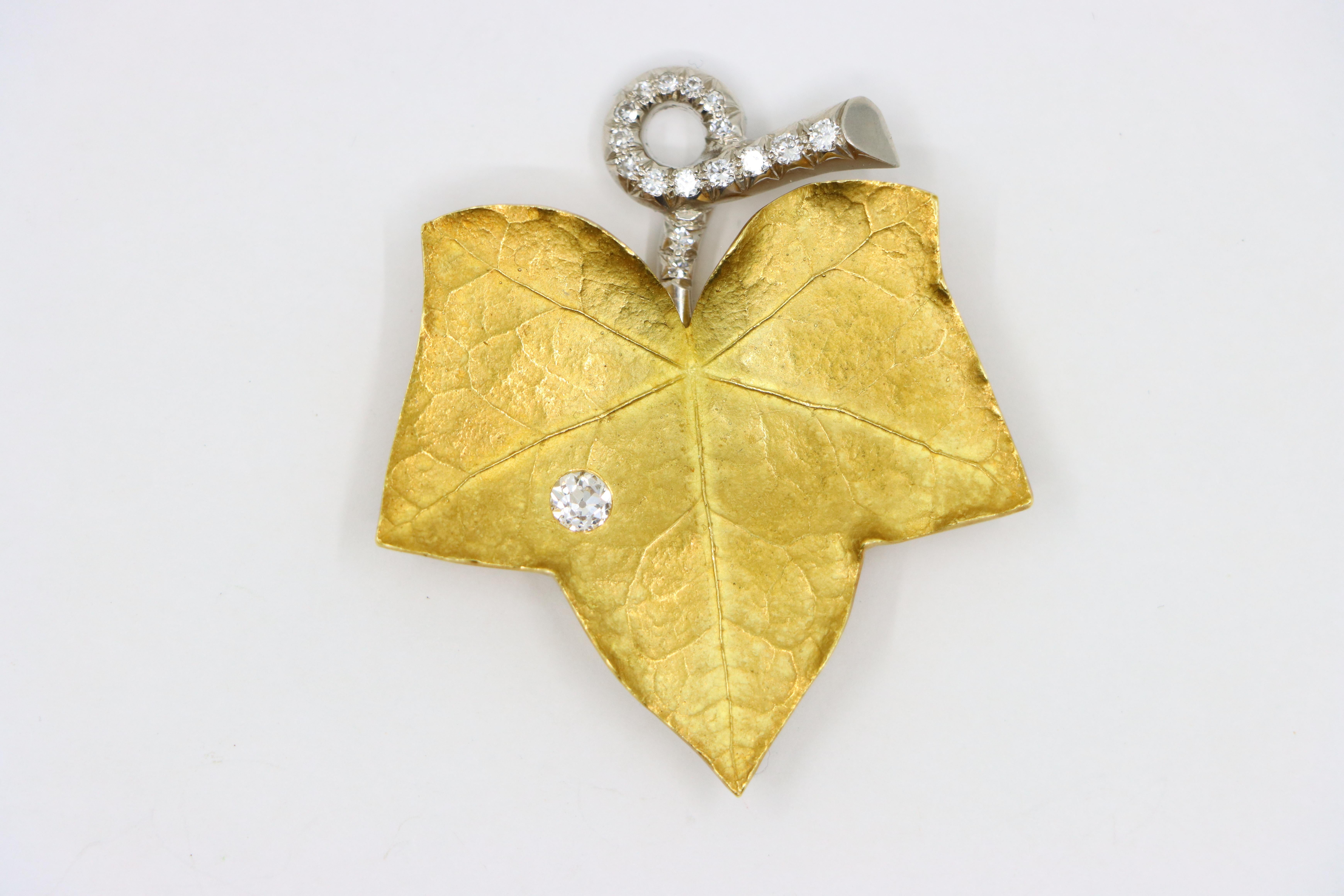 A set of Cartier 18K Gold Platinum Diamond Maple Leaf Clips 9