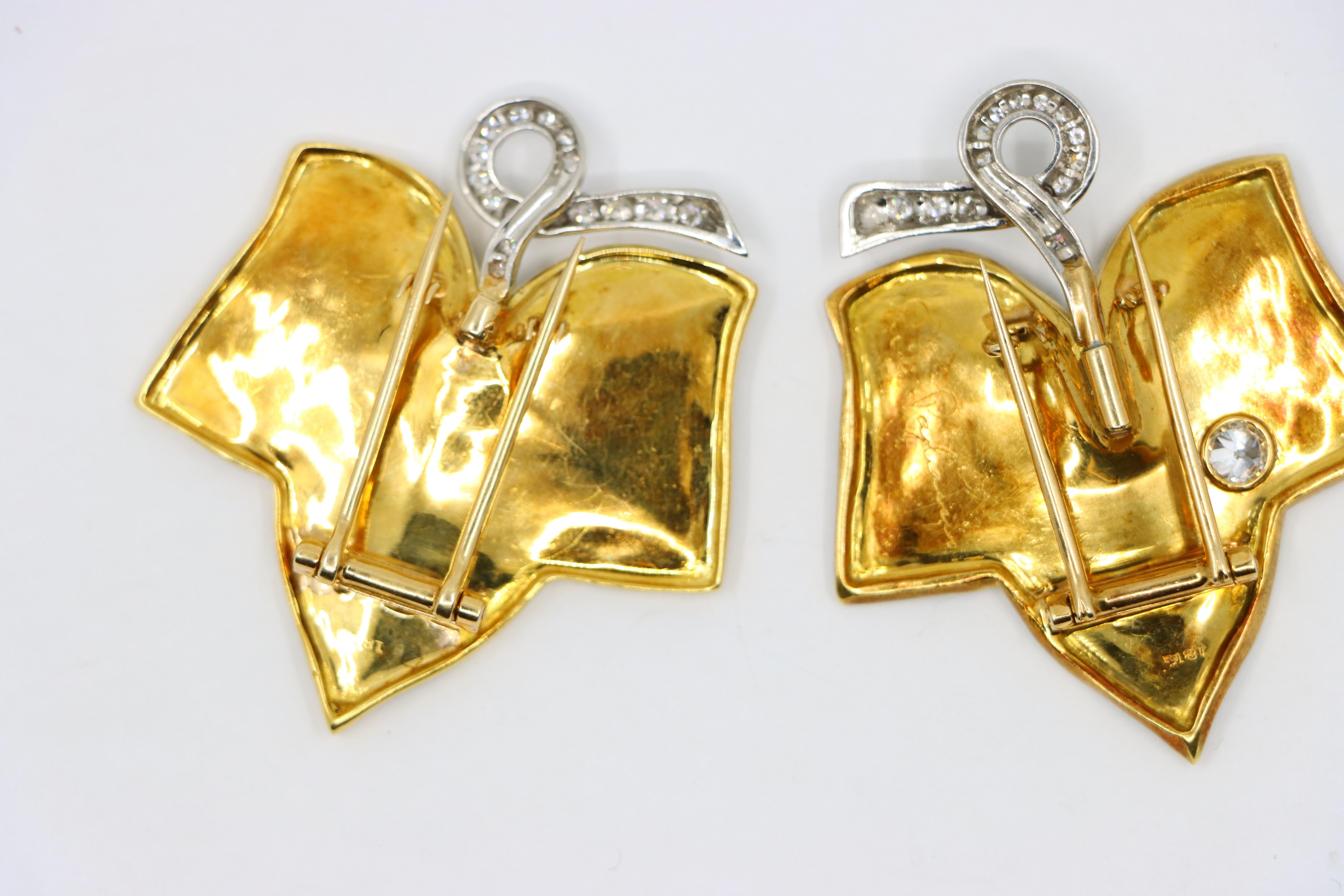 A set of Cartier 18K Gold Platinum Diamond Maple Leaf Clips 10