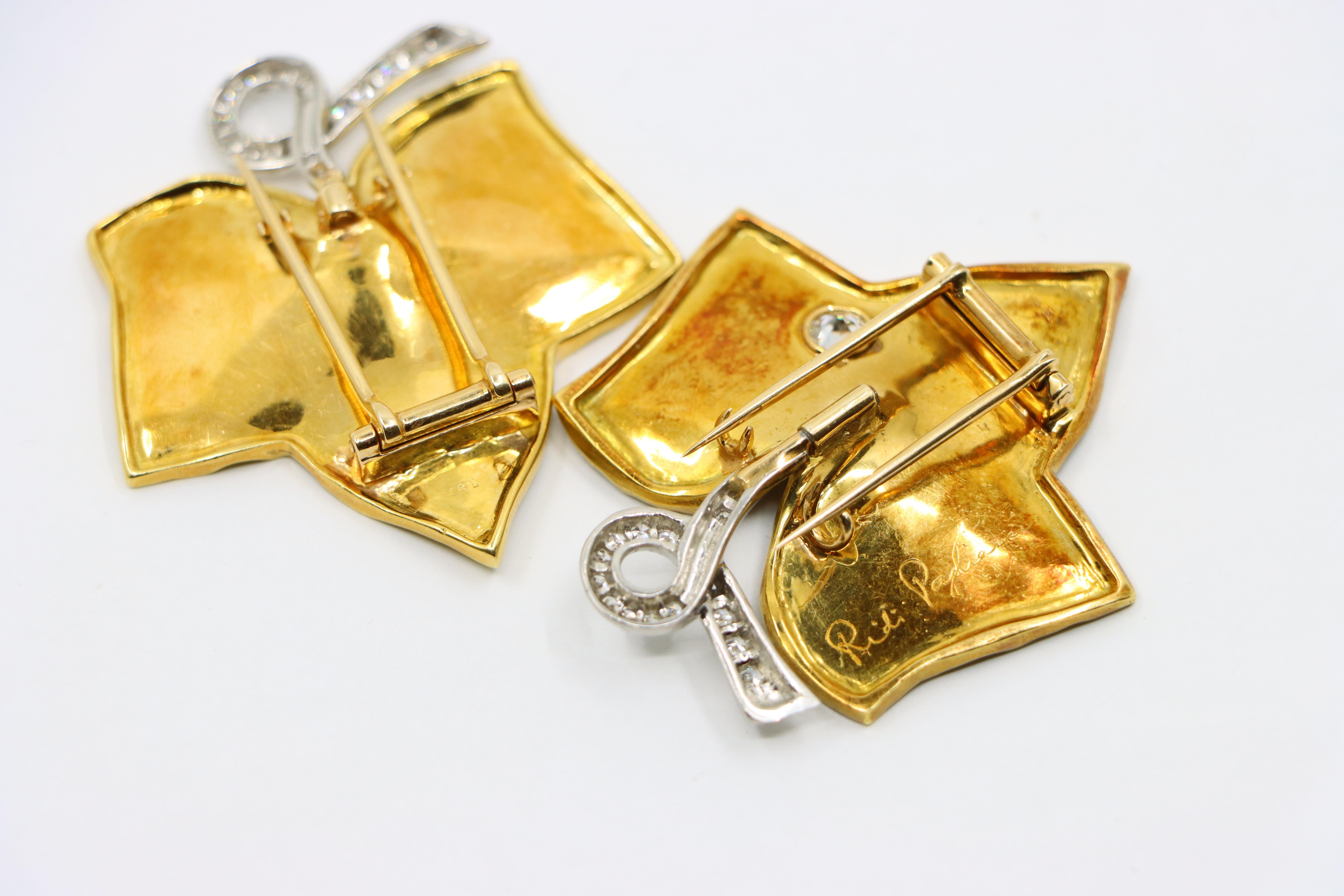A set of Cartier 18K Gold Platinum Diamond Maple Leaf Clips 11