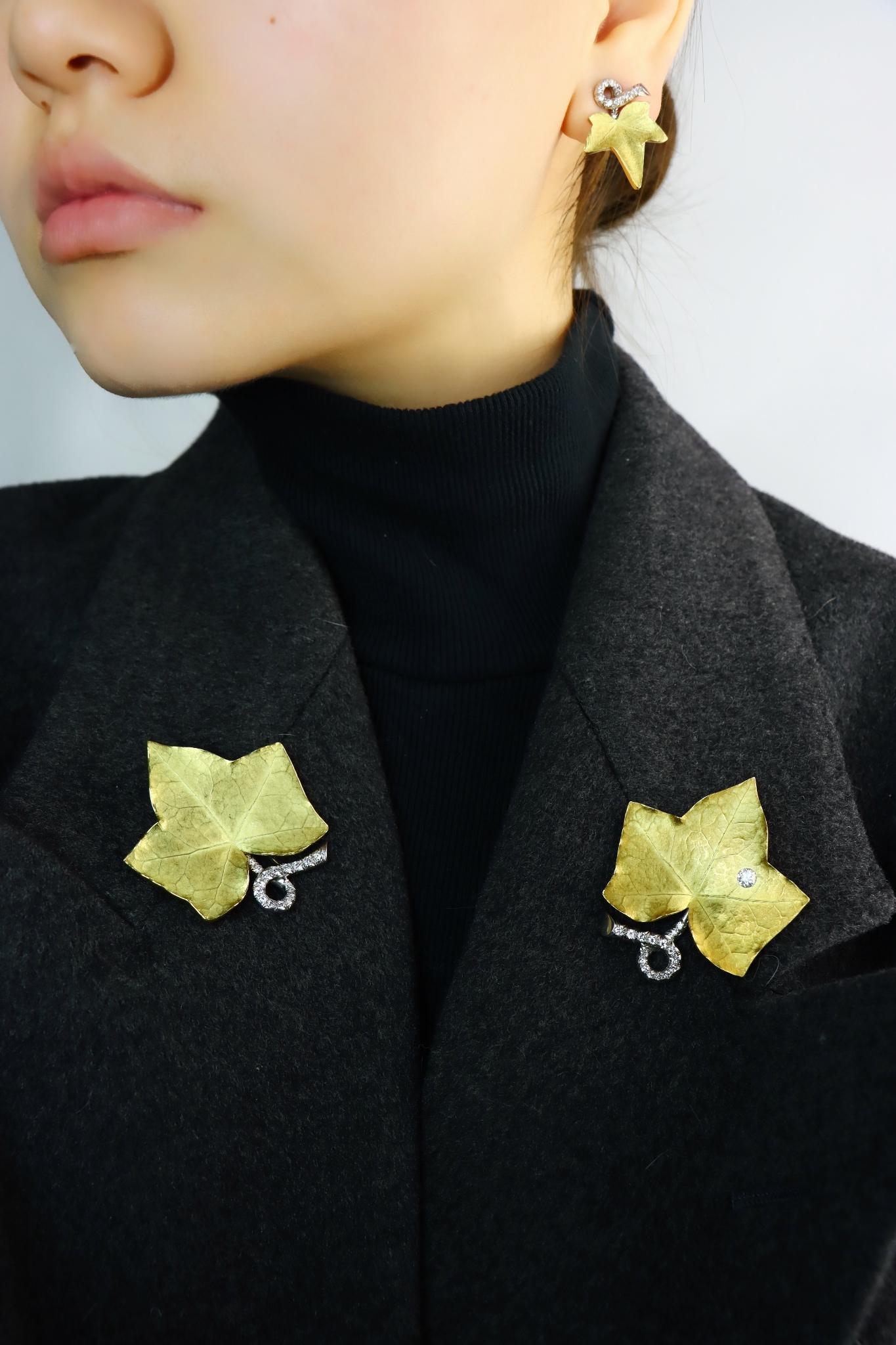 A set of Cartier 18K Gold Platinum Diamond Maple Leaf Clips

Marked:
CARTIER
18K

Approximate Dimensions:
5 cm ( Length)
4.5 cm (Width)
41.3 grams in weight.