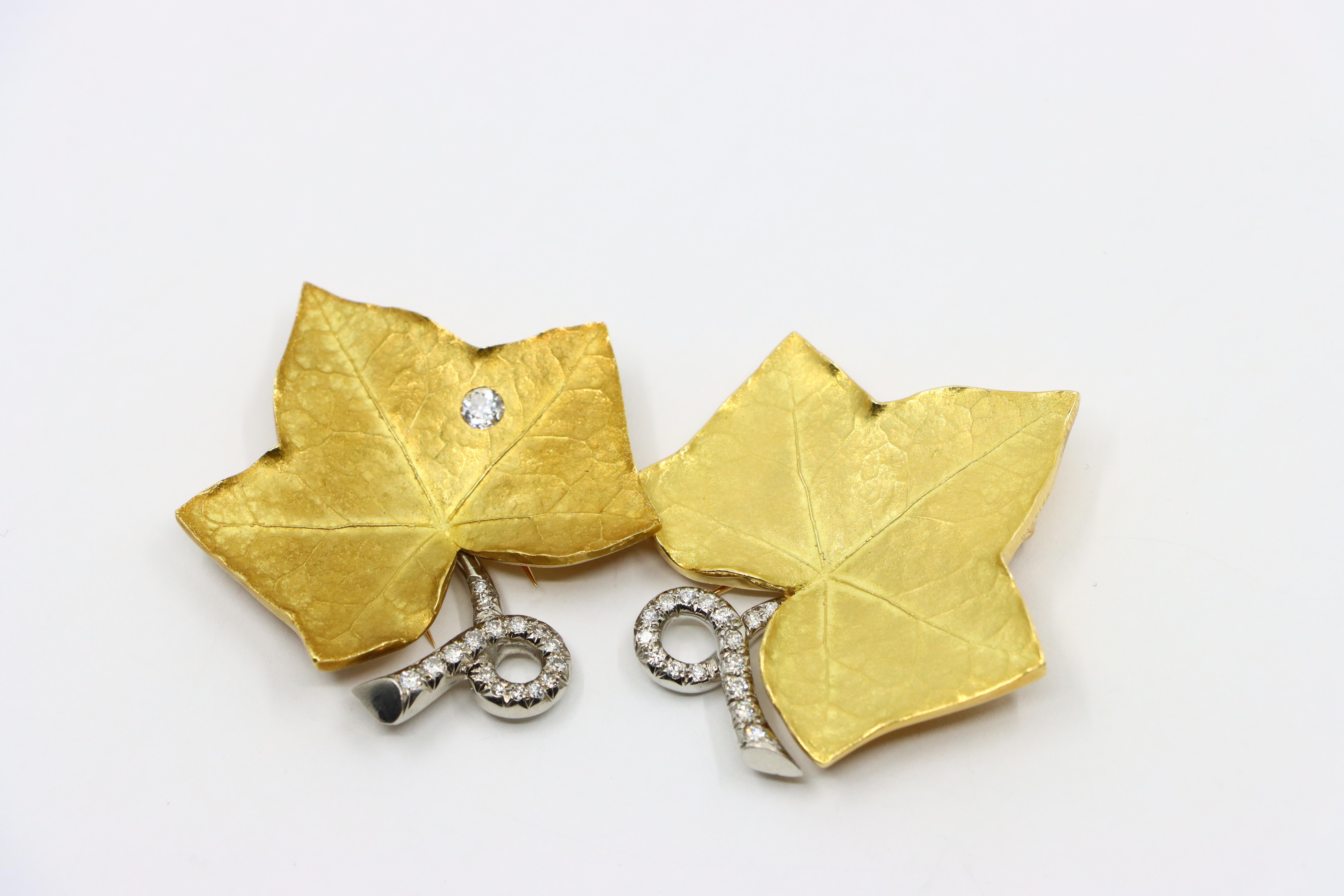 A set of Cartier 18K Gold Platinum Diamond Maple Leaf Clips 2