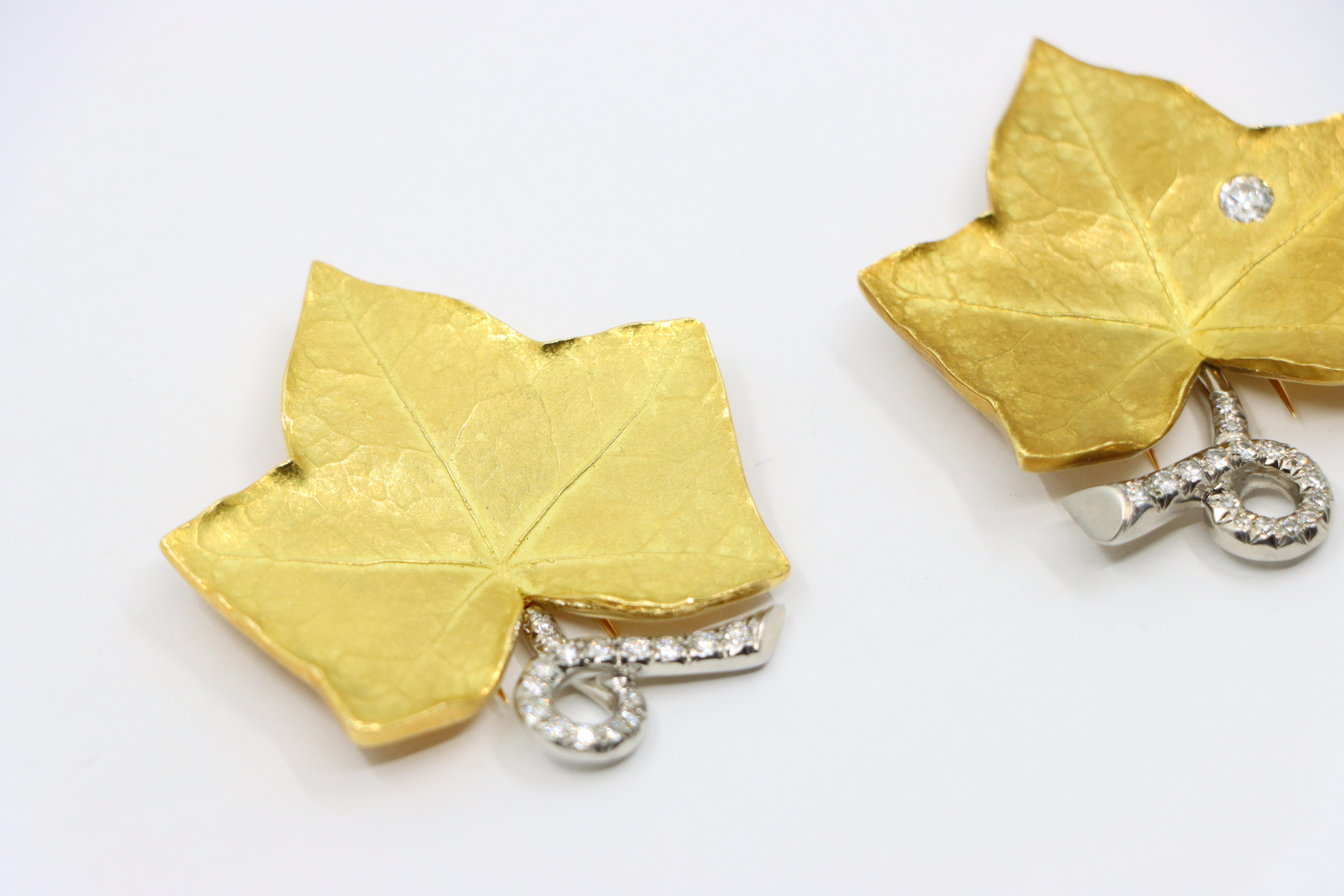 A set of Cartier 18K Gold Platinum Diamond Maple Leaf Clips 4