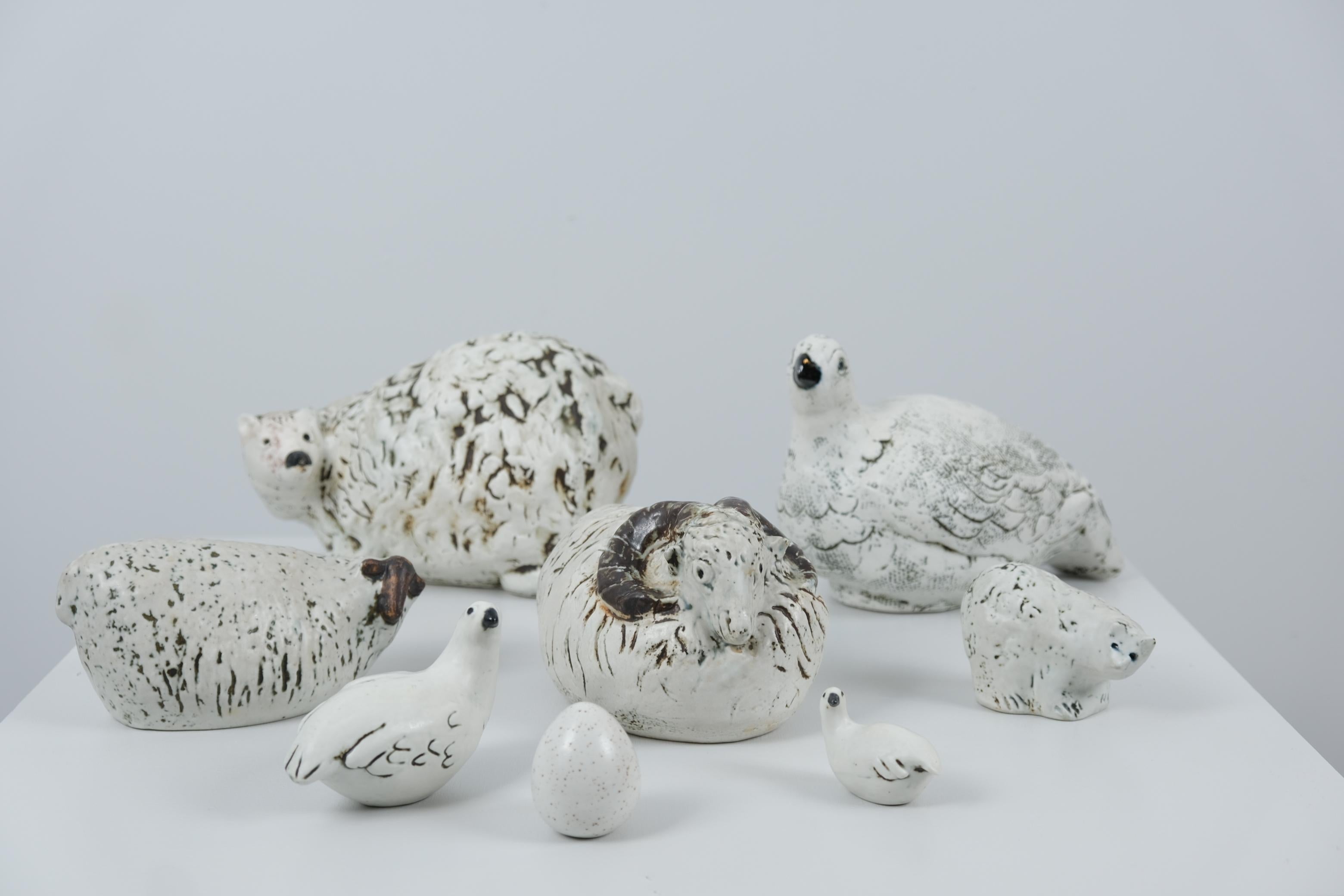 A set of highly sought after animals by Henrik Allert for Pentik from the 1980s. The set is of 7 animals / birds and one egg. All signed and marked and are in good condition. The animals are a sheep, 3 grouses, 2 bears, a ram and an egg.
Henrik