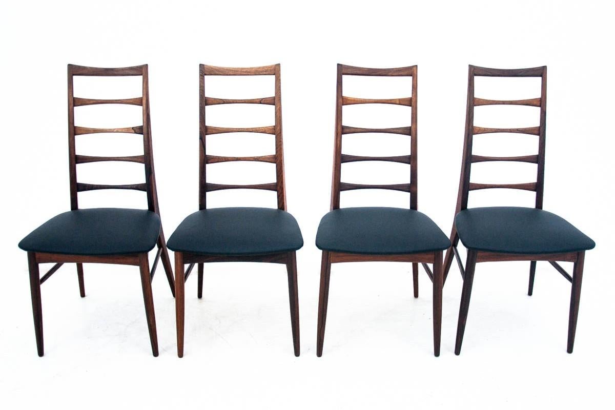 Set of four chairs designed by Niels Koefoed in the 1960s. Country of origin Denmark. Chairs with ladder backrests are a model called 