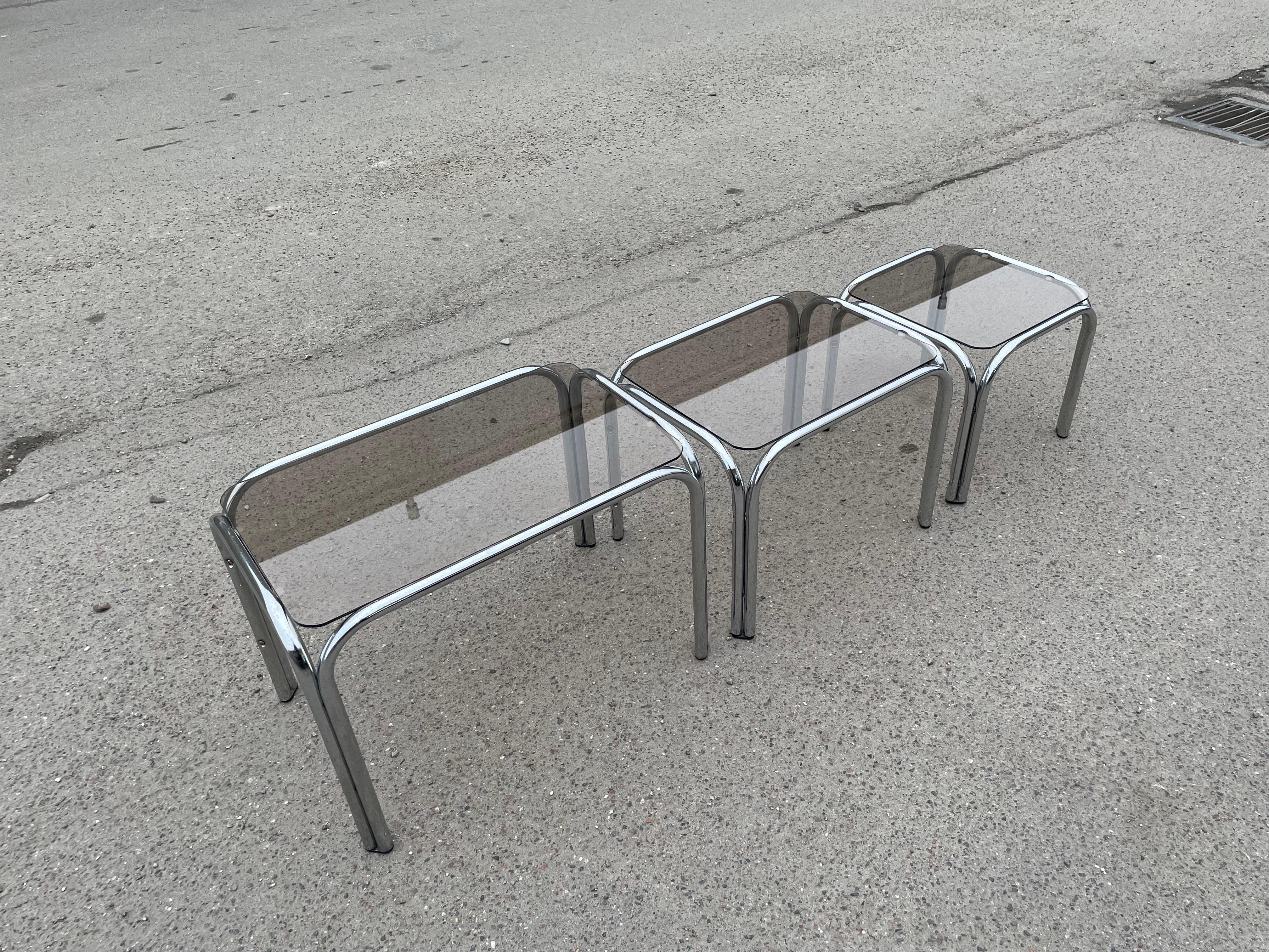 Mid-Century Modern A set of Chrome and Smoked Glass nesting tables 1970’s  For Sale