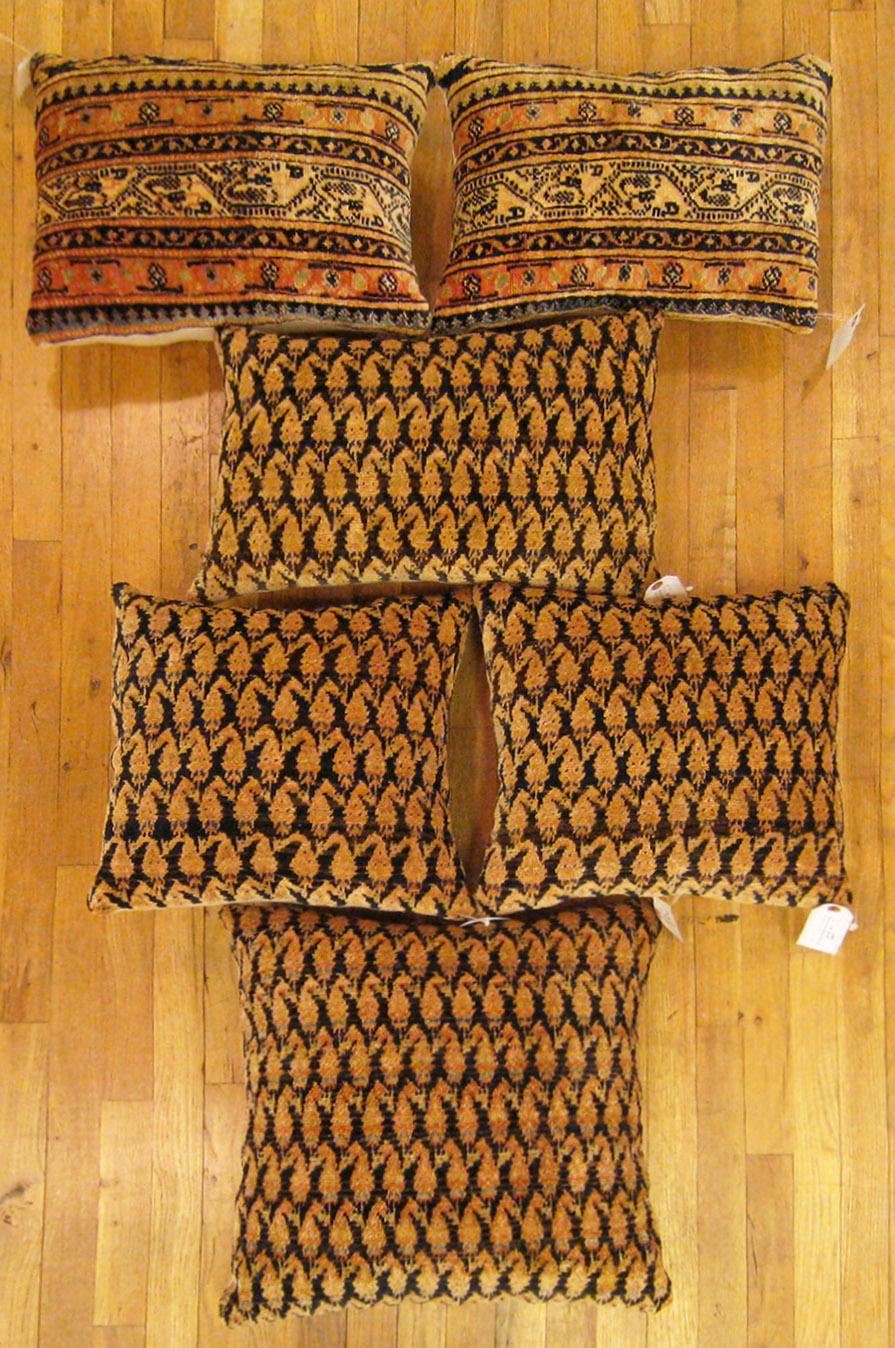 A Set of Antique Persian Saraband carpet pillows ; size 1'8” x 1'8” and 1' 6