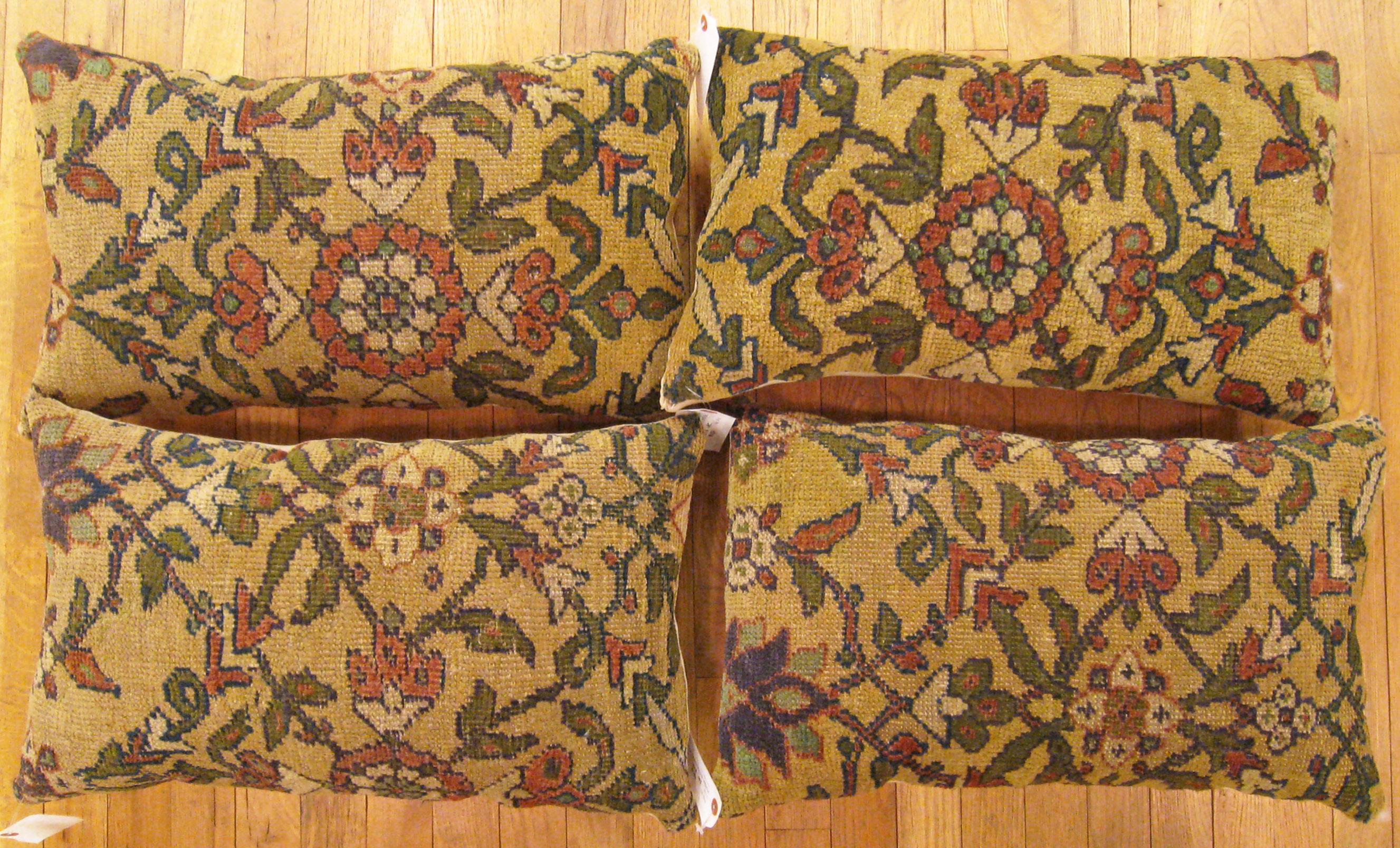 A set of antique Persian Sultanabad carpet pillows ; size 2'0” x 1'3” Each.

An antique decorative pillows with floral elements allover a cream central field, size 2'0” x 1'3” each. This lovely decorative pillow features an antique fabric of a
