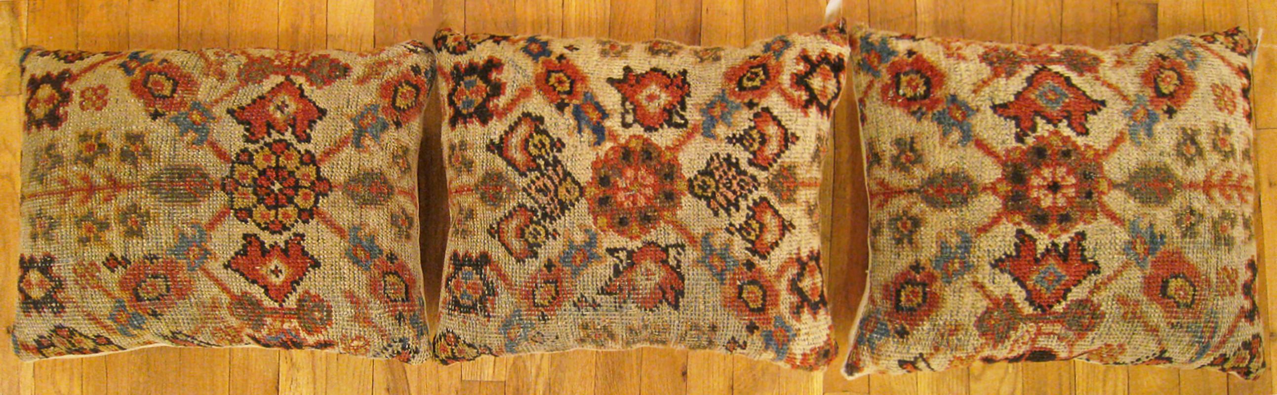 A set of antique Persian sultanabad pillows ; size 1'8” x 1'4” and 1'8