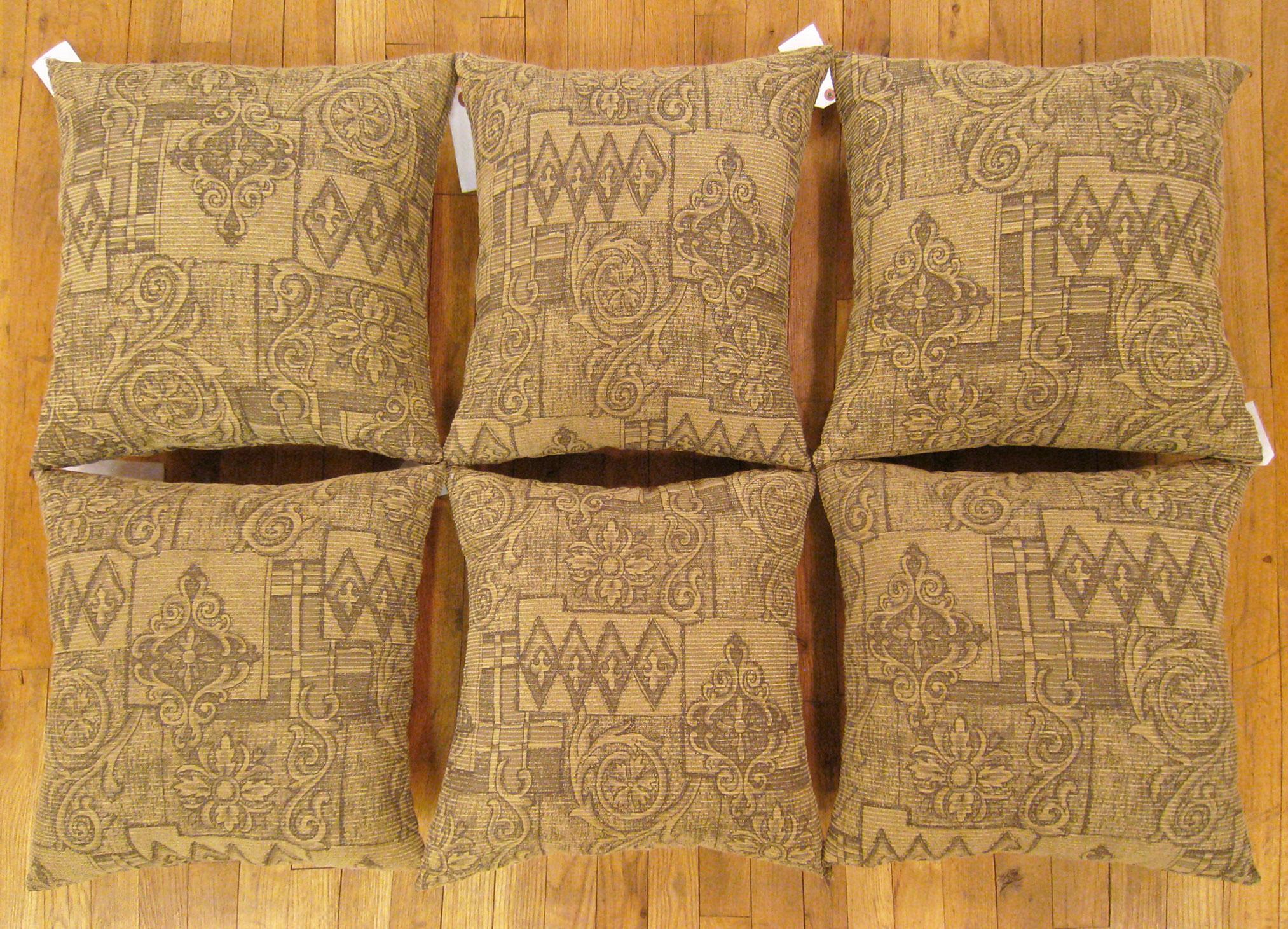 A Set of Vintage Floro-geometric fabric pillows ; size 1'8” x 1'6” Each.

A vintage american pillows with geometric abstracts in a beige central field, size 1'8” x 1'6” each. This lovely decorative pillow features a vintage fabric of a American