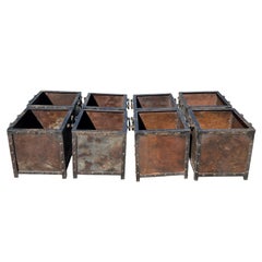 A Set of Eight 20th Century Antique Industrial Riveted Steel Bins from France