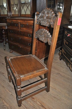 Set of Eight 20th Century Carved Oak Jacobean Style English Chairs