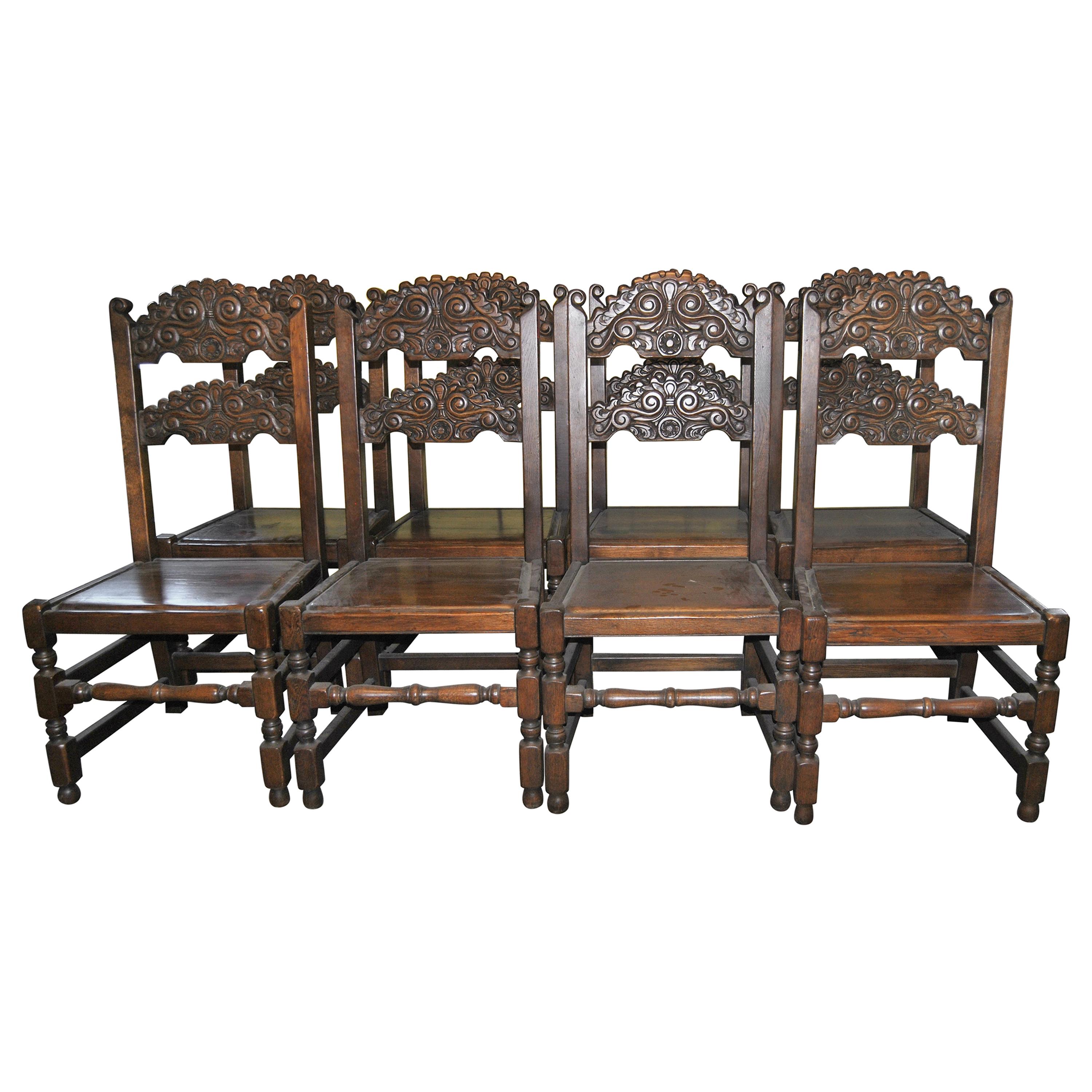 Set of Eight 20th Century Carved Oak Jacobean Style English Chairs