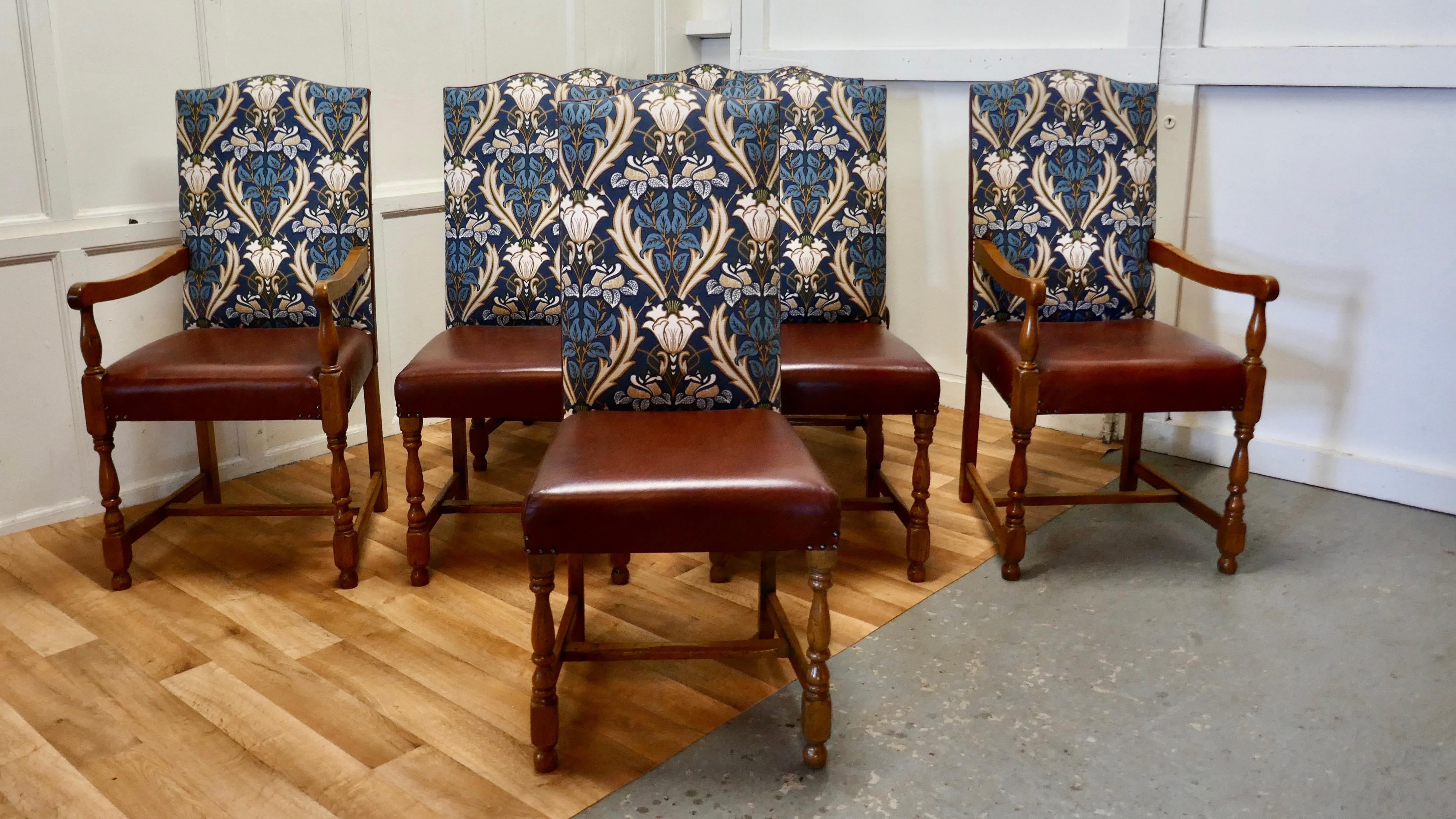 A set of eight Arts & Crafts golden oak dining chairs 

A Very Good Quality set of Large High Back Arts & Crafts Oak Dining Chairs there are a pair of carver chairs and six singles, the seats are upholstered in good quality soft tan leather, the