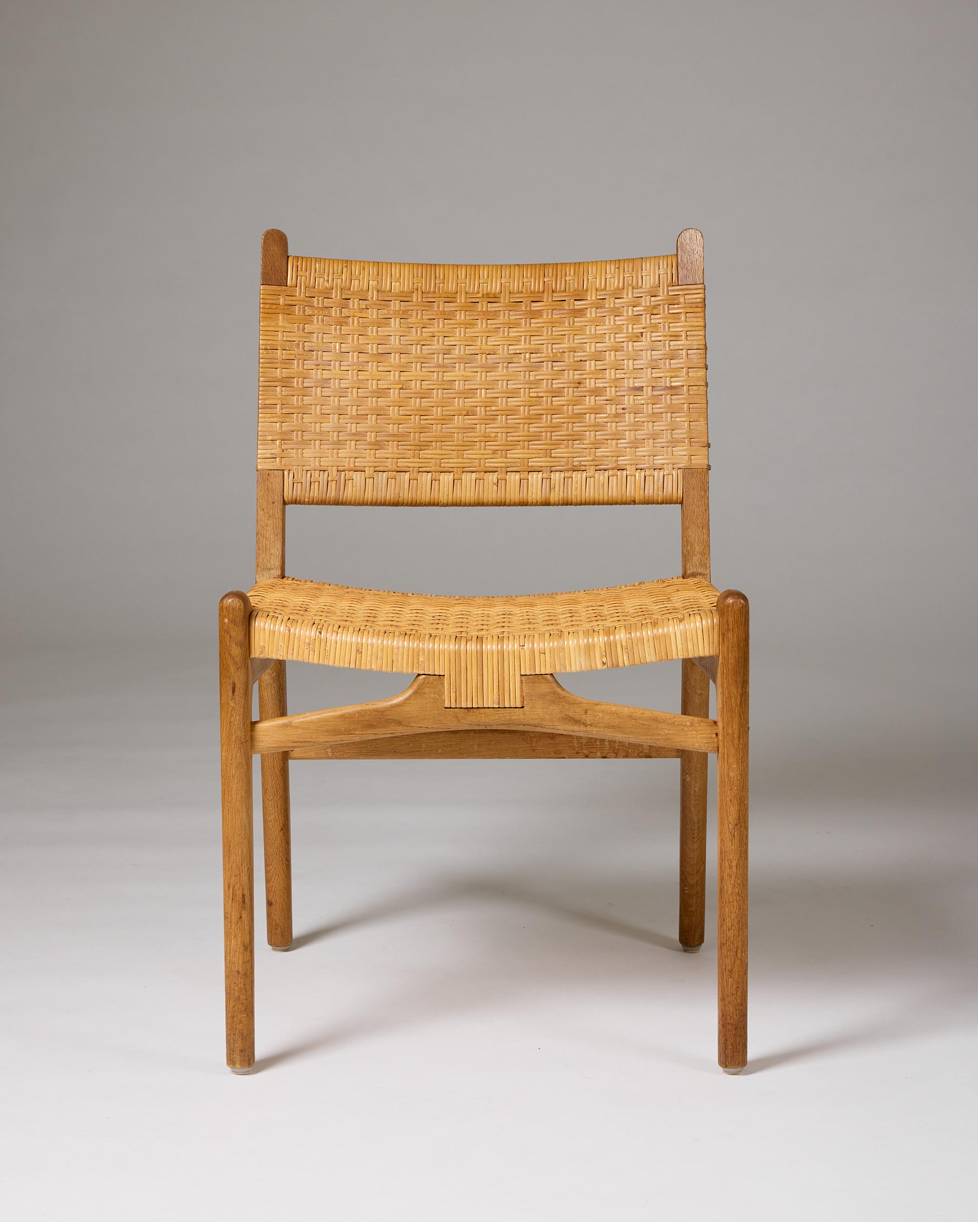 Rattan A set of eight ‘CH31’ chairs by Hans J. Wegner for Carl Hansen & Son, Danmark