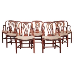 A Set of Eight Eighteenth Century Oak Dining Chairs