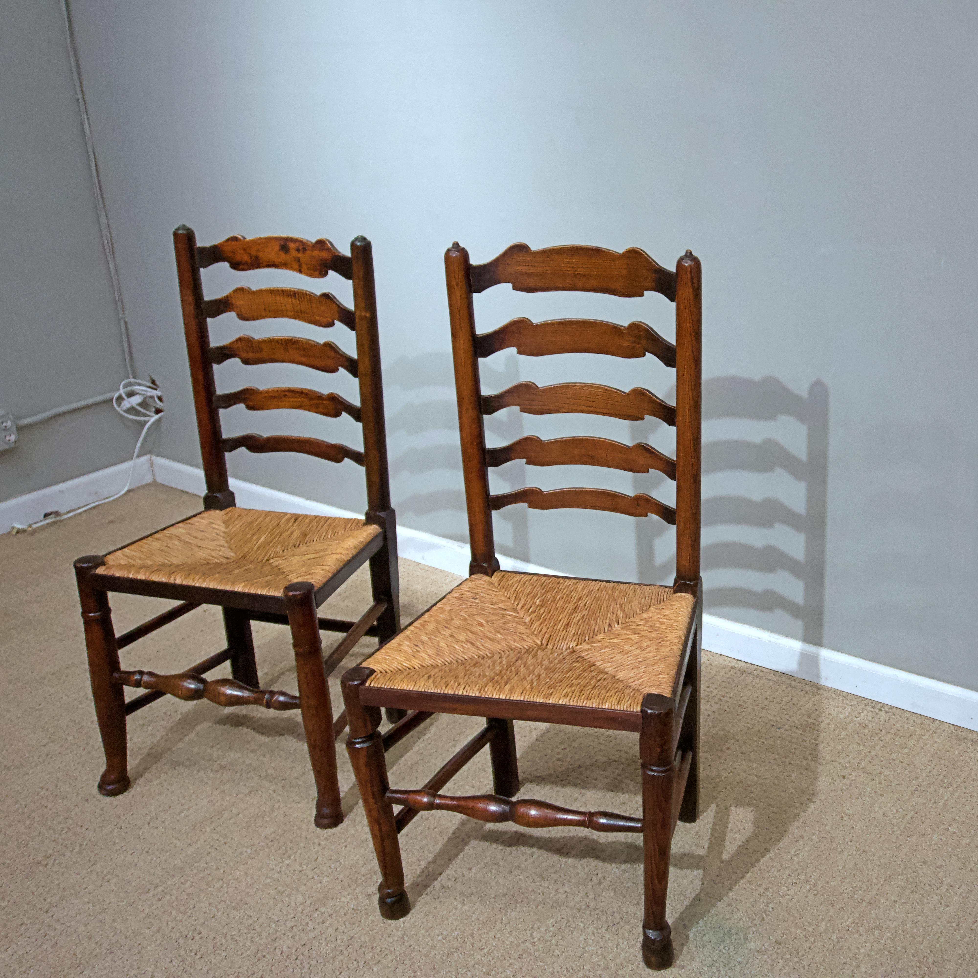 Polished Set of Eight English Oak Ladder Back Chairs with Rush Seats