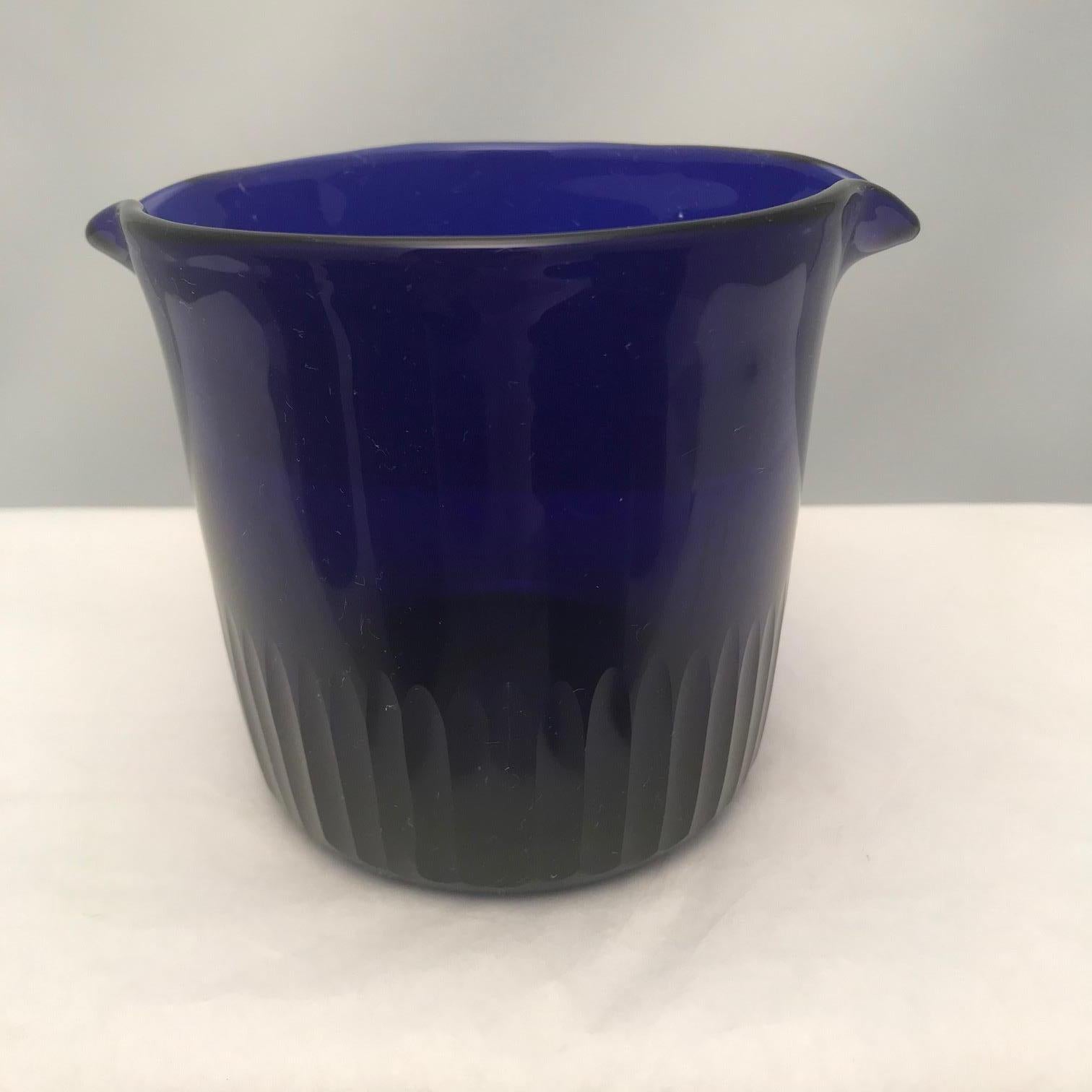 Hand blown and double-lipped, this set is also cut with vertical blazes for added elegance. The deep cobalt is most desirable and contributes a dash of color and sophisticated style to your dining room.