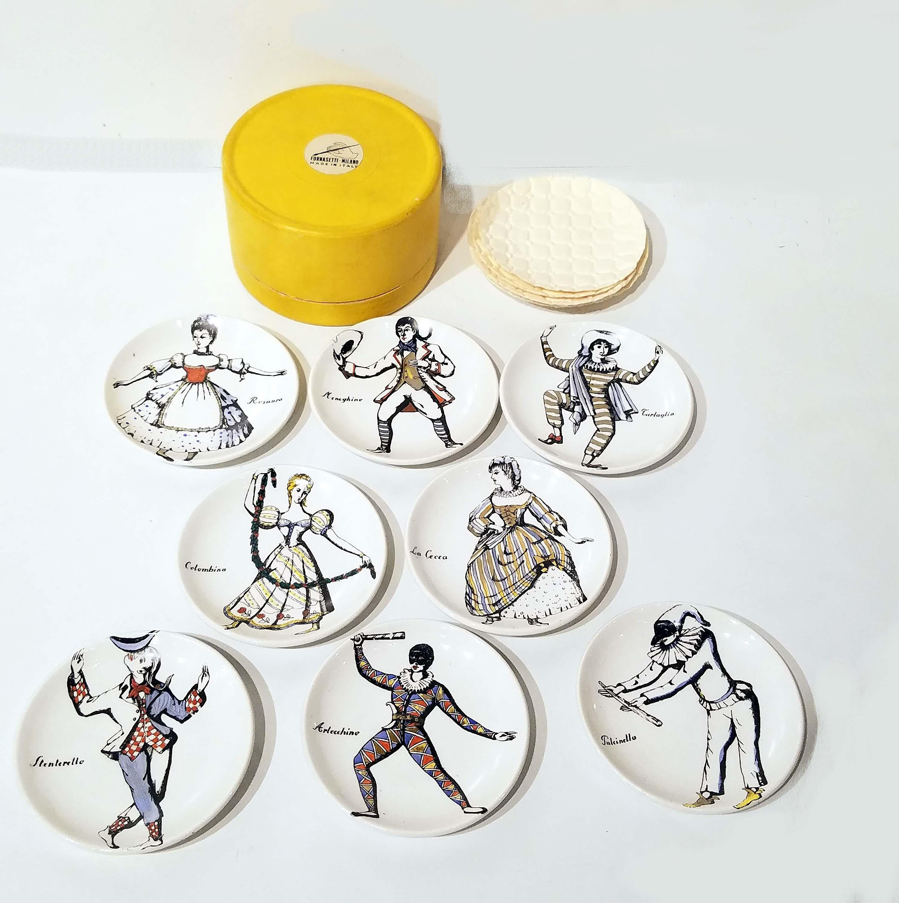 Piero Fornasetti (1913-1988)
A set of eight 'MASCHERE ITALIANE' coasters, 1950s
lithographically-decorated and hand painted porcelain, with original box
Measures: Each 3? in. diameter
each marked FORNASETTI MILANO MADE IN ITALY.
   