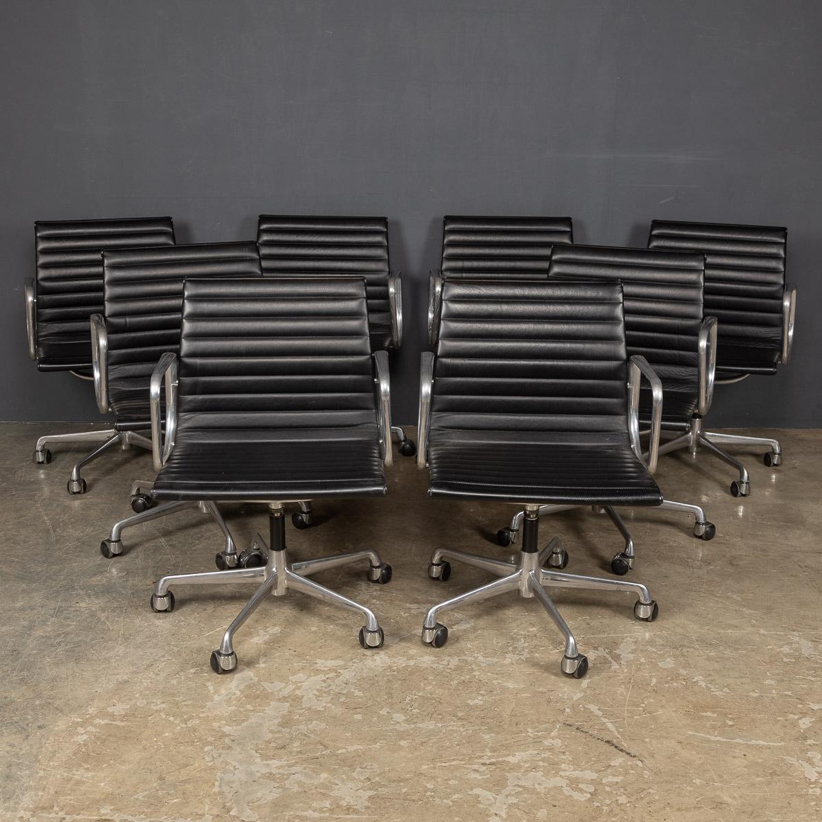 A set of eight leather and polished aluminium swivel chairs, known as the group management chairs, created by Charles and Ray Eames for Herman Miller. Originally designed for the modern 1950’s office these chairs have manual height adjustment and