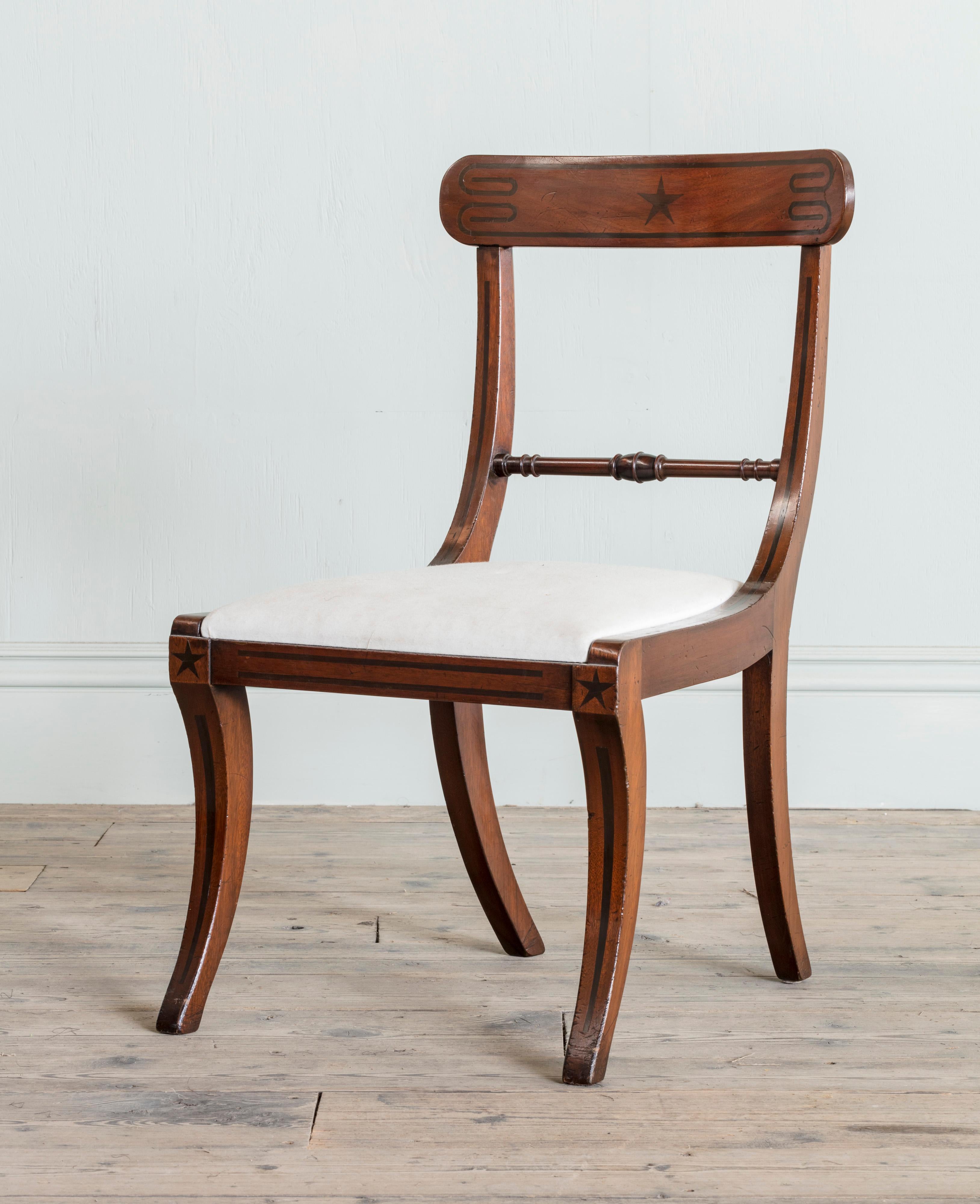 Hand-Carved Set of Eight Regency Mahogany Dining Chairs, Including a Pair of Elbow Chairs For Sale