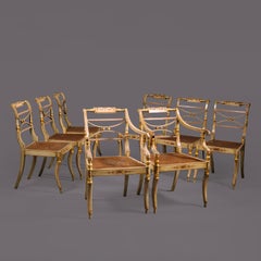 A Set of Eight Regency Polychrome-Painted And Parcel-Gilt Dining Chairs