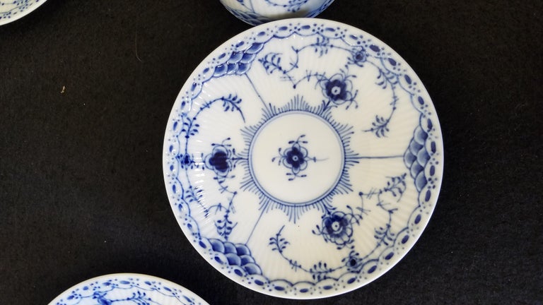 A set of eight royal Copenhagen porcelain espresso cups and saucers in the most desirable half lace pattern. Each one clearly marked on the underside.