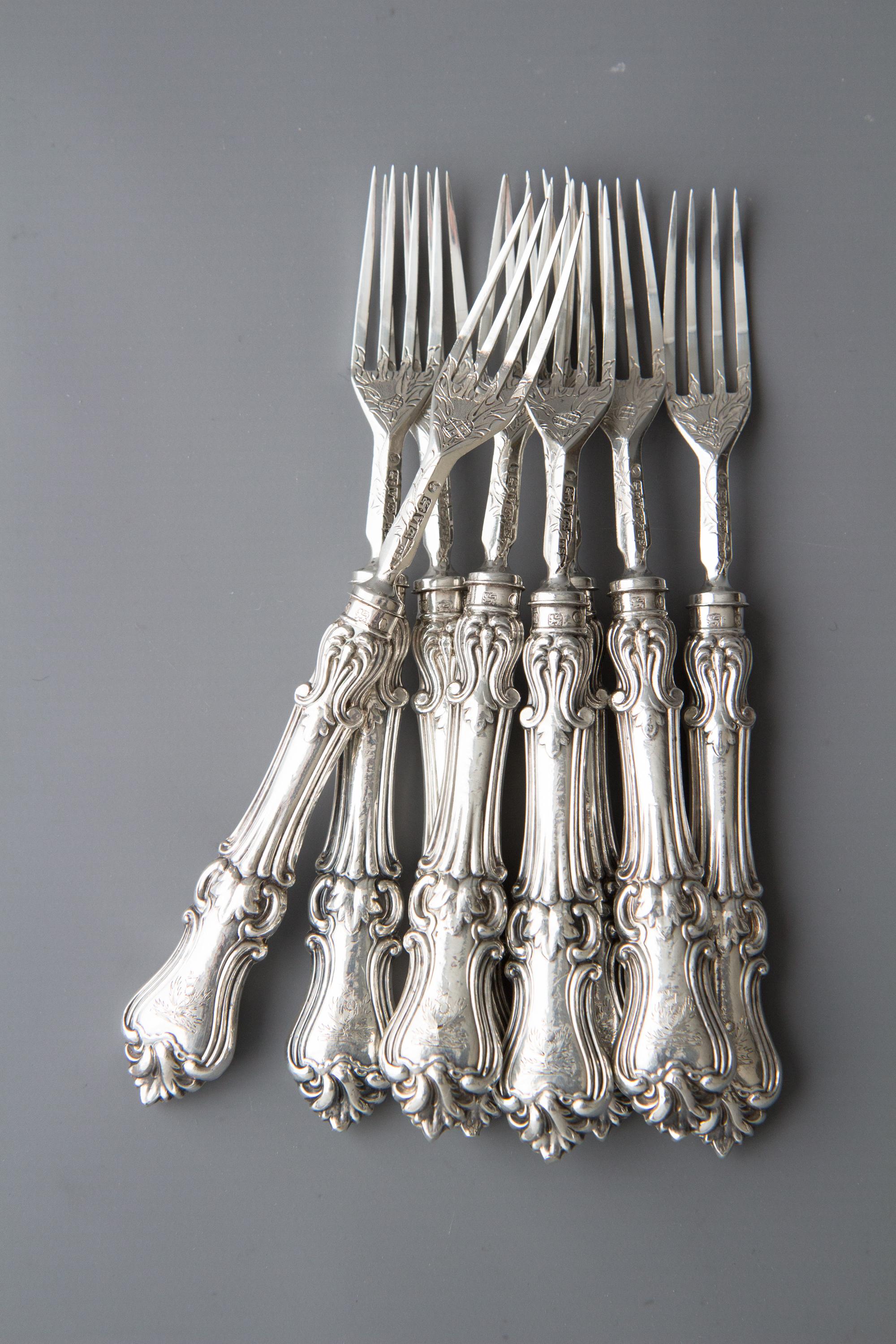 A very good set of Victorian silver fruit or dessert knives and forks for eight people. Each knife blade and each fork engraved with the thistle and the rose. This is probably in reference to the famous Scottish poem. The filled silver handled