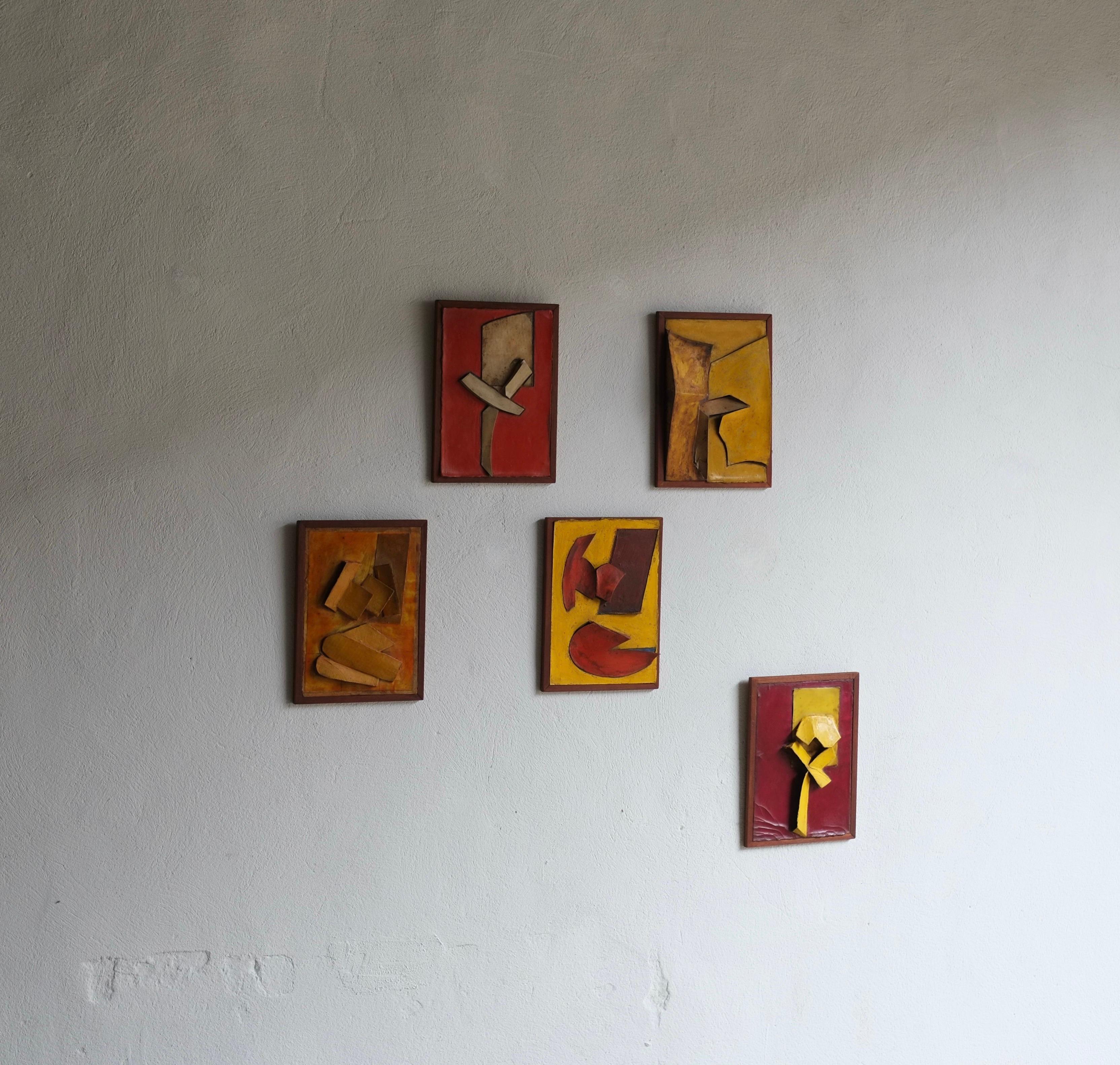 A set of five abstract reliefs by British artist Tim Threlfall (b.1940).

Beginning his career working as an assistant to Henry Moore, Bryan Kneale and John Hoskin Threlfall's career spanned from 1964 – 1999 his work was collected and exhibited