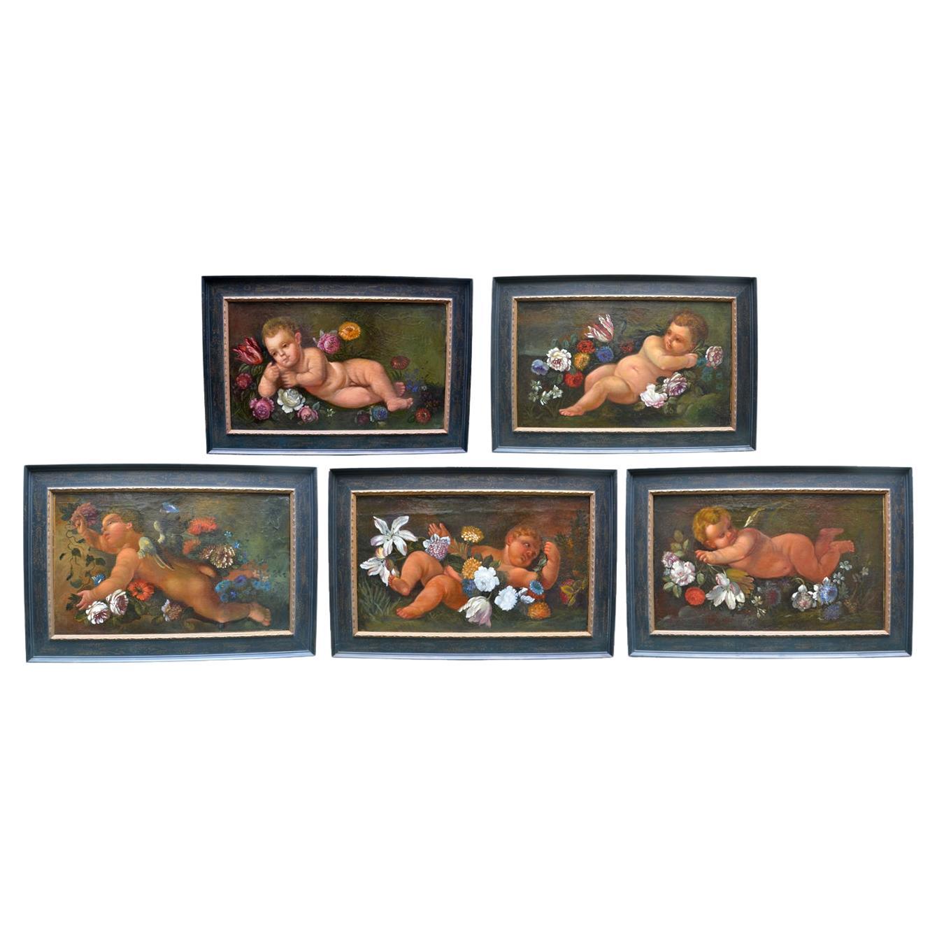 Set of Five Italian 18 Century Reclining or Flying Puttis Set Amidst Flowers For Sale