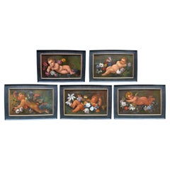 Set of Five Italian 18 Century Reclining or Flying Puttis Set Amidst Flowers