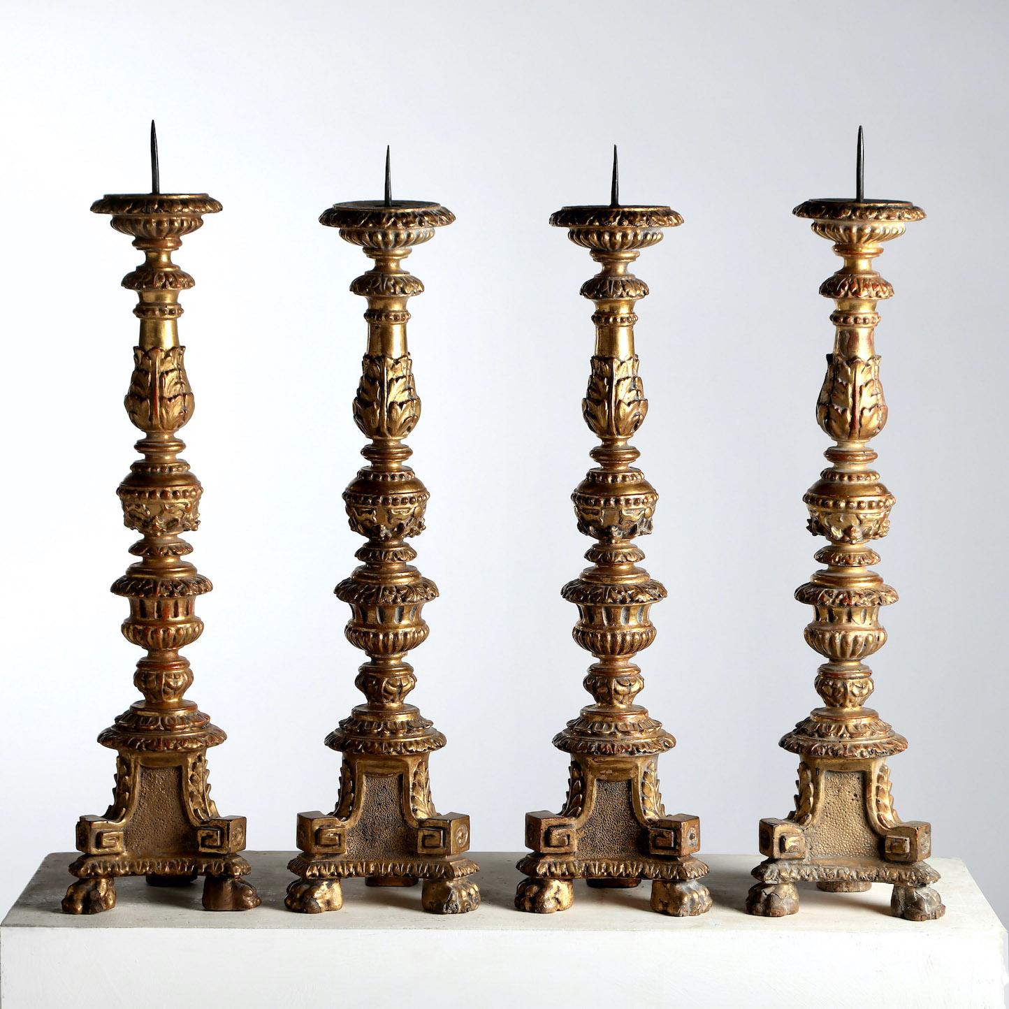 Giltwood A Set of Four 18th Century Candlesticks