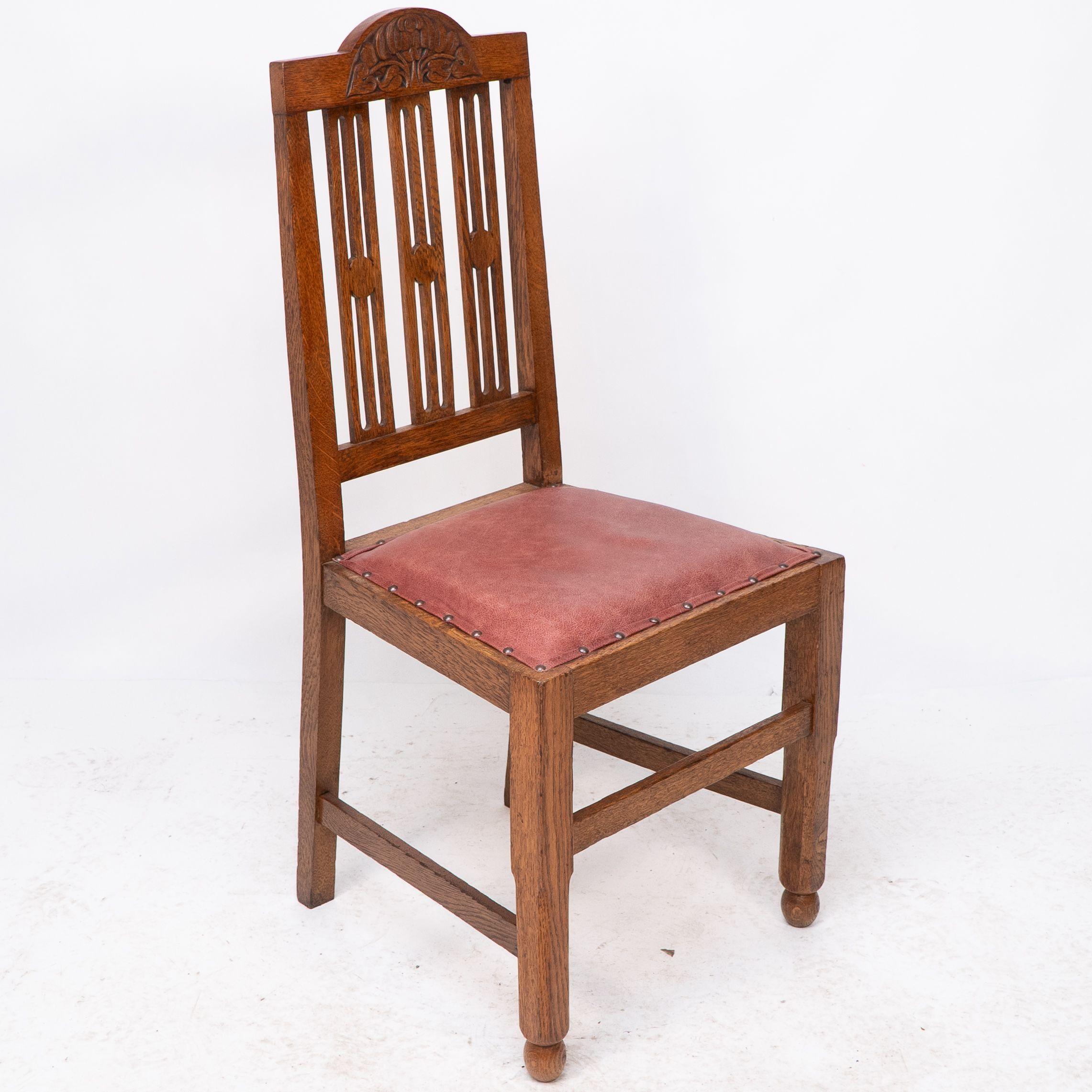 A set of four Arts and Crafts dining chairs with nicely carved floral decoration For Sale 5
