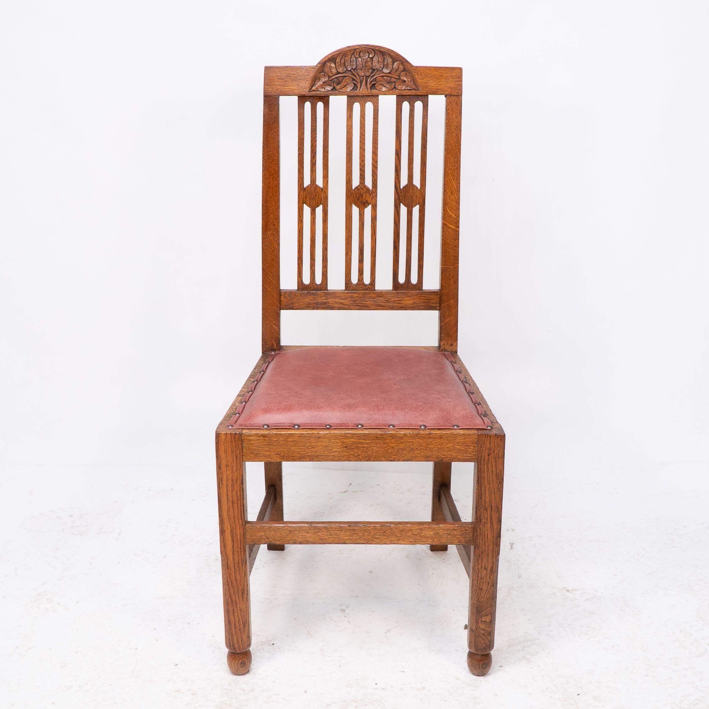 A set of four Arts and Crafts dining chairs with nicely carved floral decoration For Sale 6