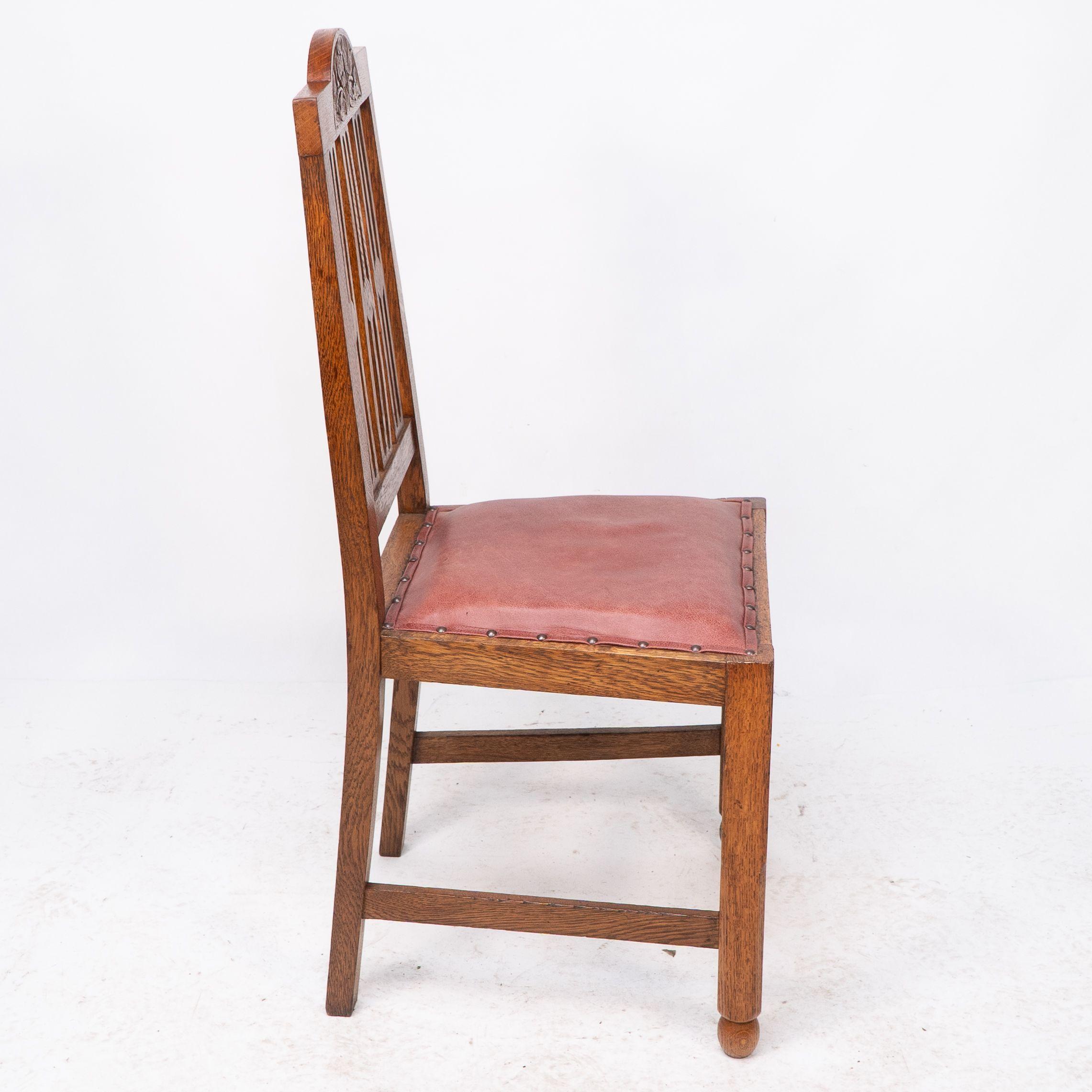 A set of four Arts and Crafts dining chairs with nicely carved floral decoration For Sale 9