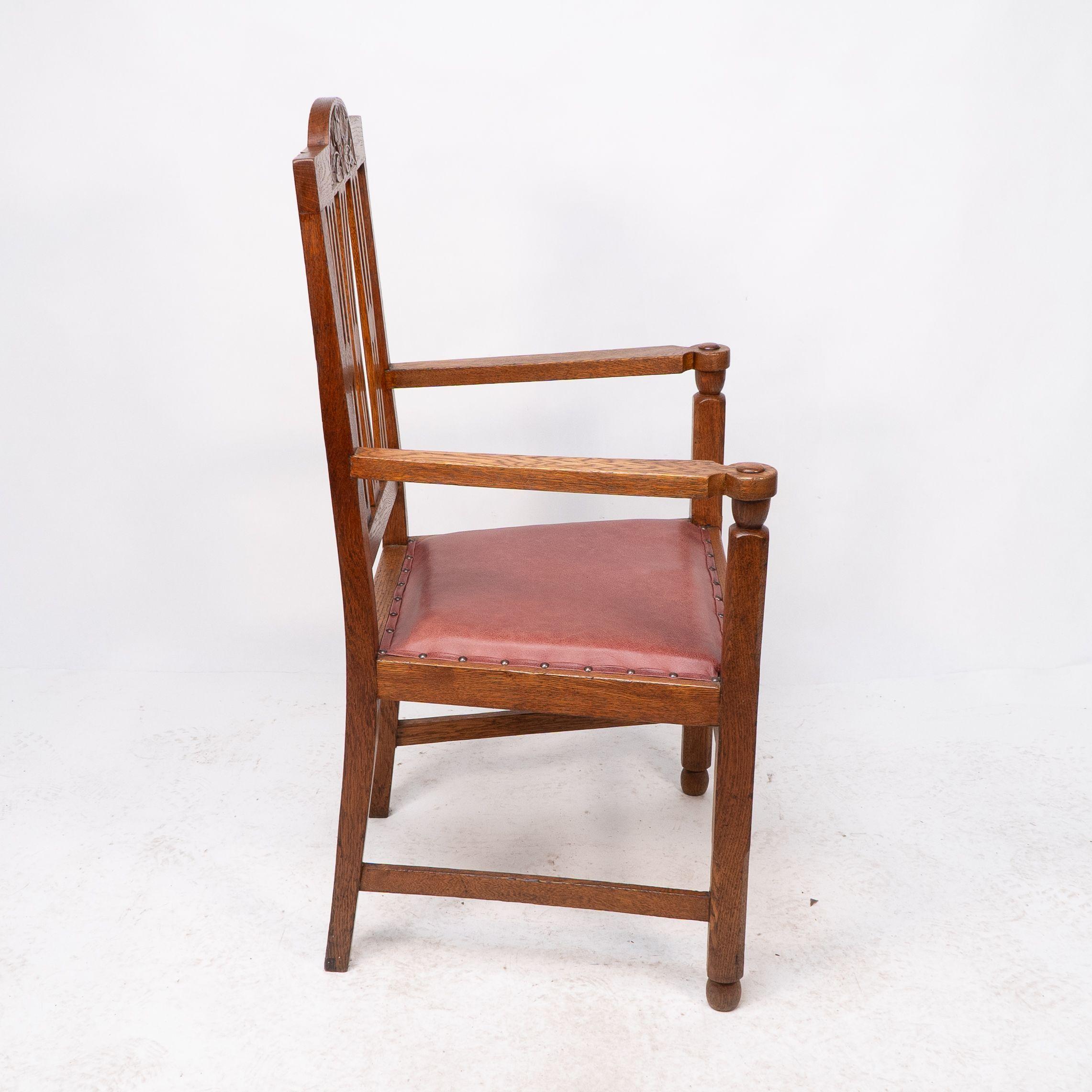 A set of four Arts and Crafts dining chairs with nicely carved floral decoration For Sale 1