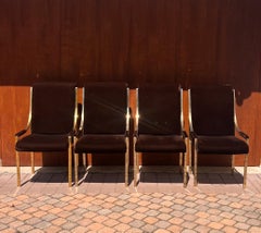 A set of four brass and brown velvet dining room chairs, 20th century