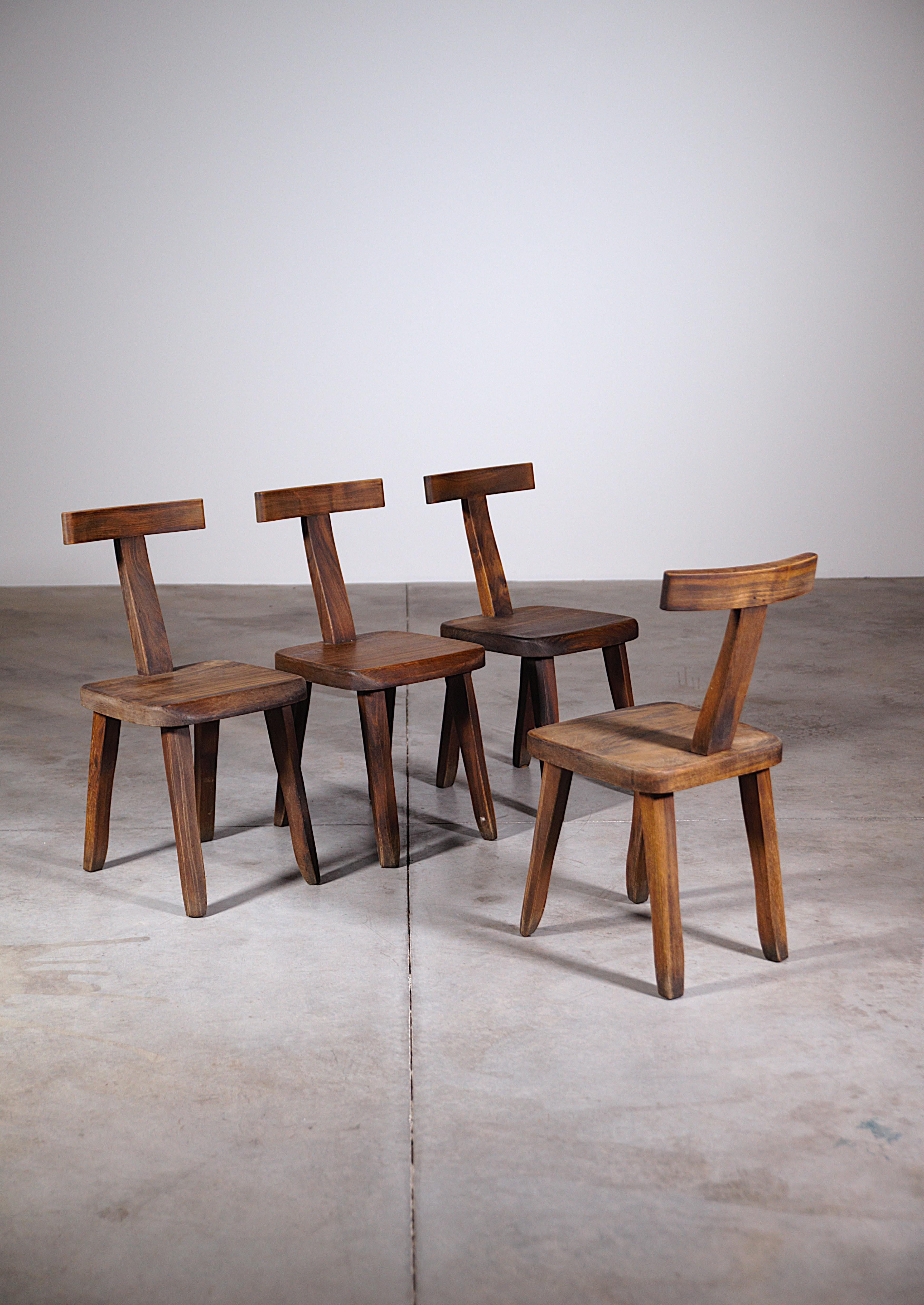 A Set of four chairs by Aranjou France 1970s

In patinated elmwood

In original good condition.