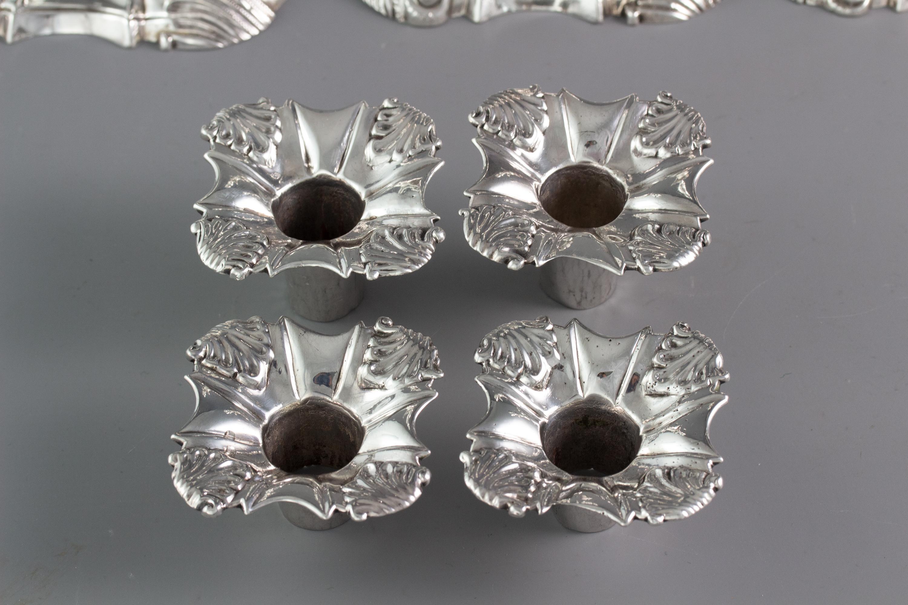 British Set of Four Cast Silver Candlesticks, London, 1764-1765