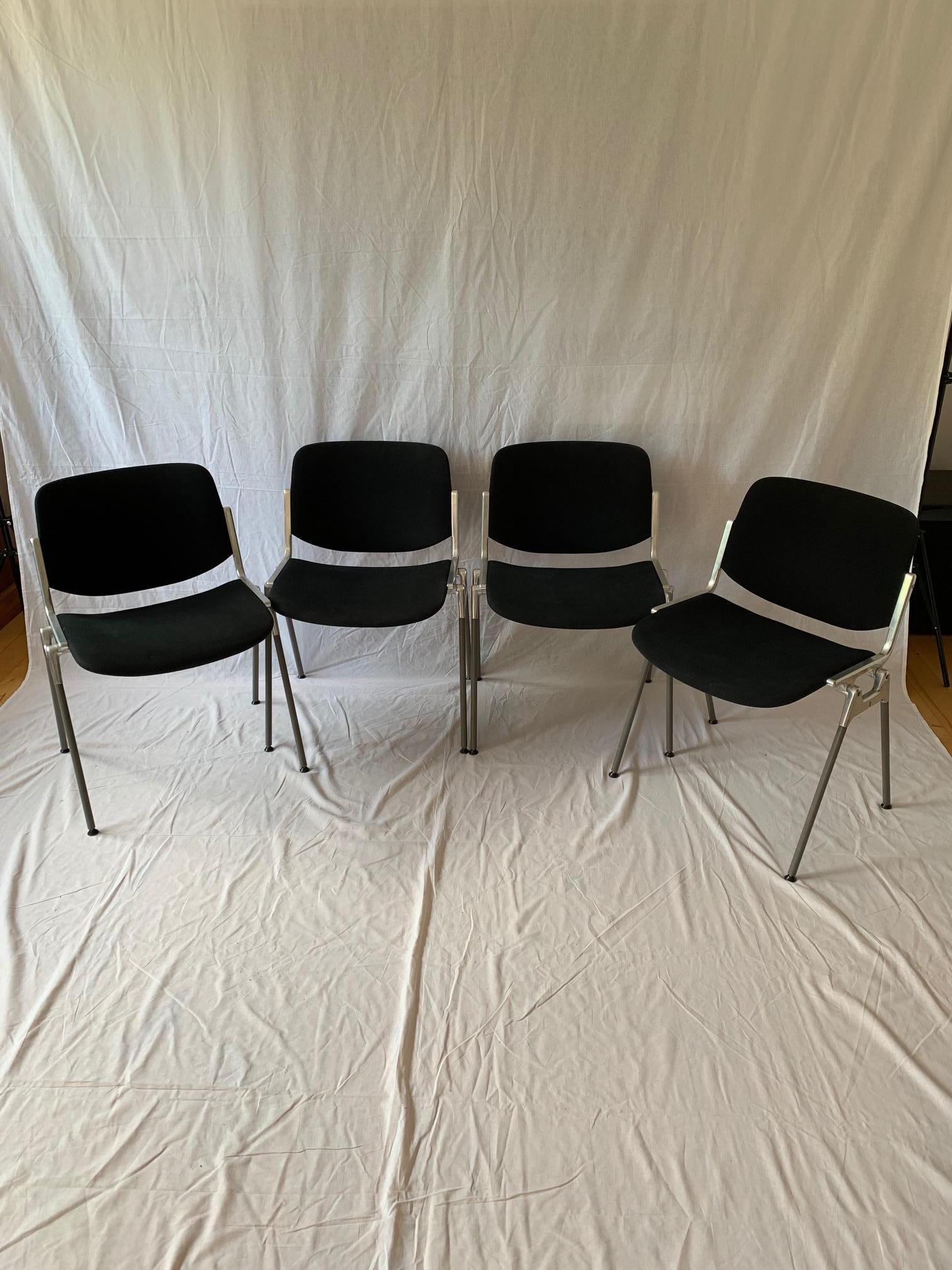 A set of four Castelli DSC 106 chairs, designed by Giancarlo Piretti, Italy, 90s. Chairs fully original and signed. Stelarz made of cast aluminum. Attractive, timeless form.