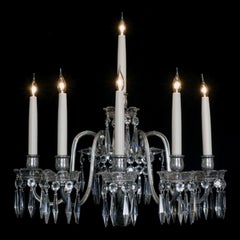 A Set of Four Cut Crystal Six-Light Silvered Wall Appliques