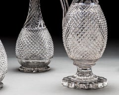 A Set of Four Diamond & Swirl Cut Decanters With Corresponding Wine Ewer