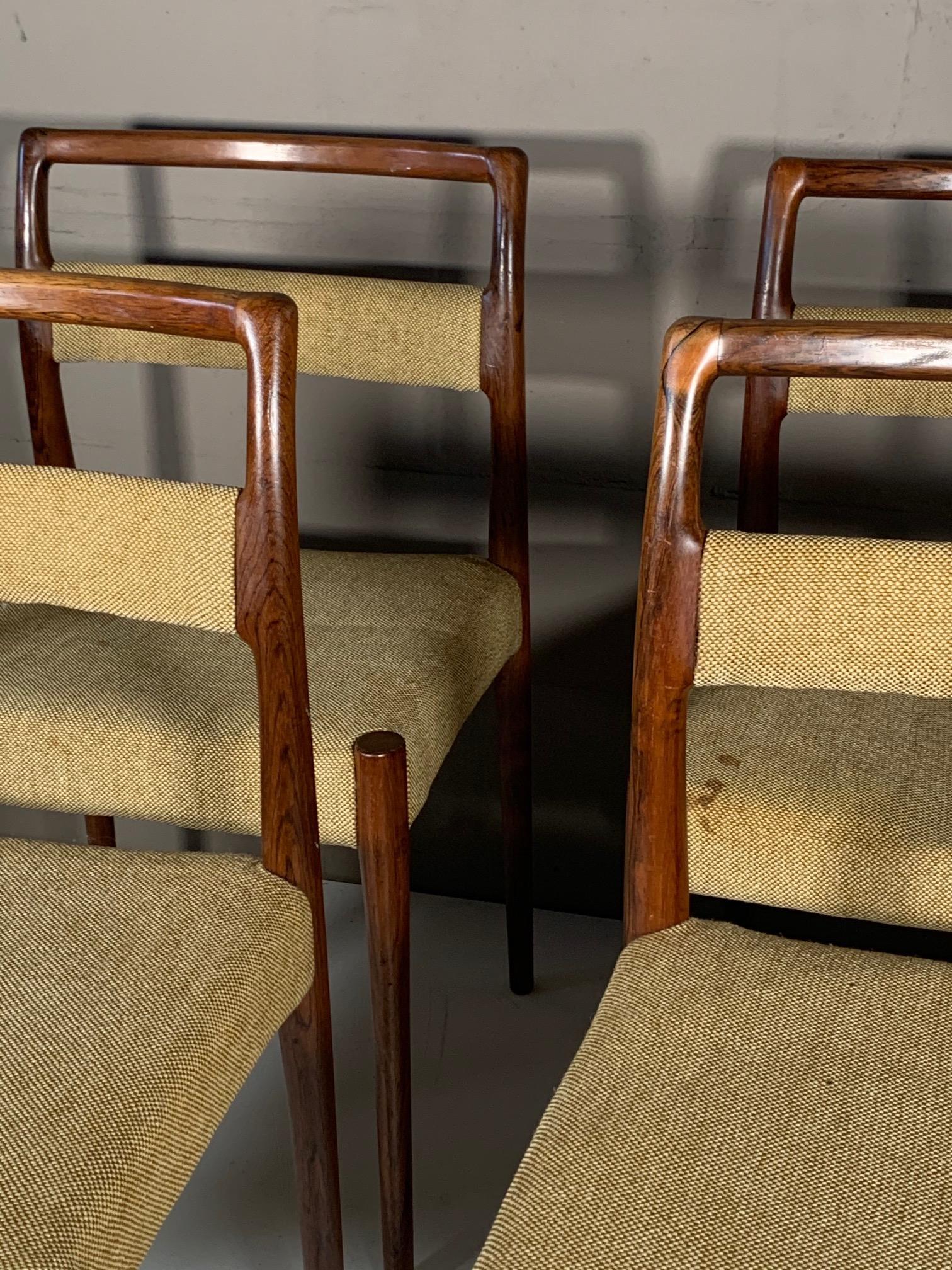A rare set of four (4) dining chairs, OD70 designed by Kai Kristiansen and made in Denmark by OD MØBLER, circa 1960s. Sculptural frames in Brazilian rosewood with beautiful graining, original fabric.