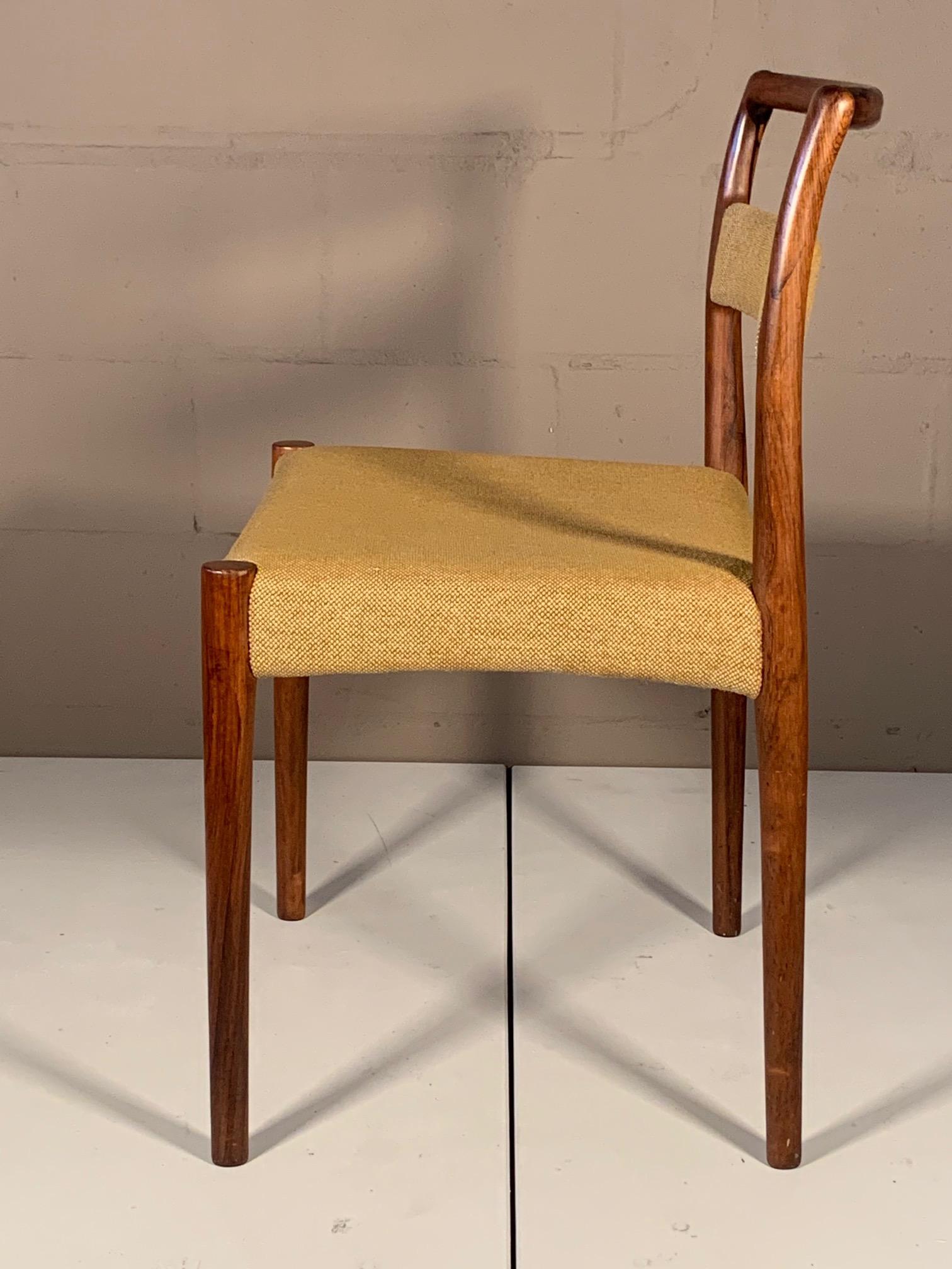 Danish Set of Four Dining Chairs by Kai Kristiansen in Brazilian Rosewood For Sale