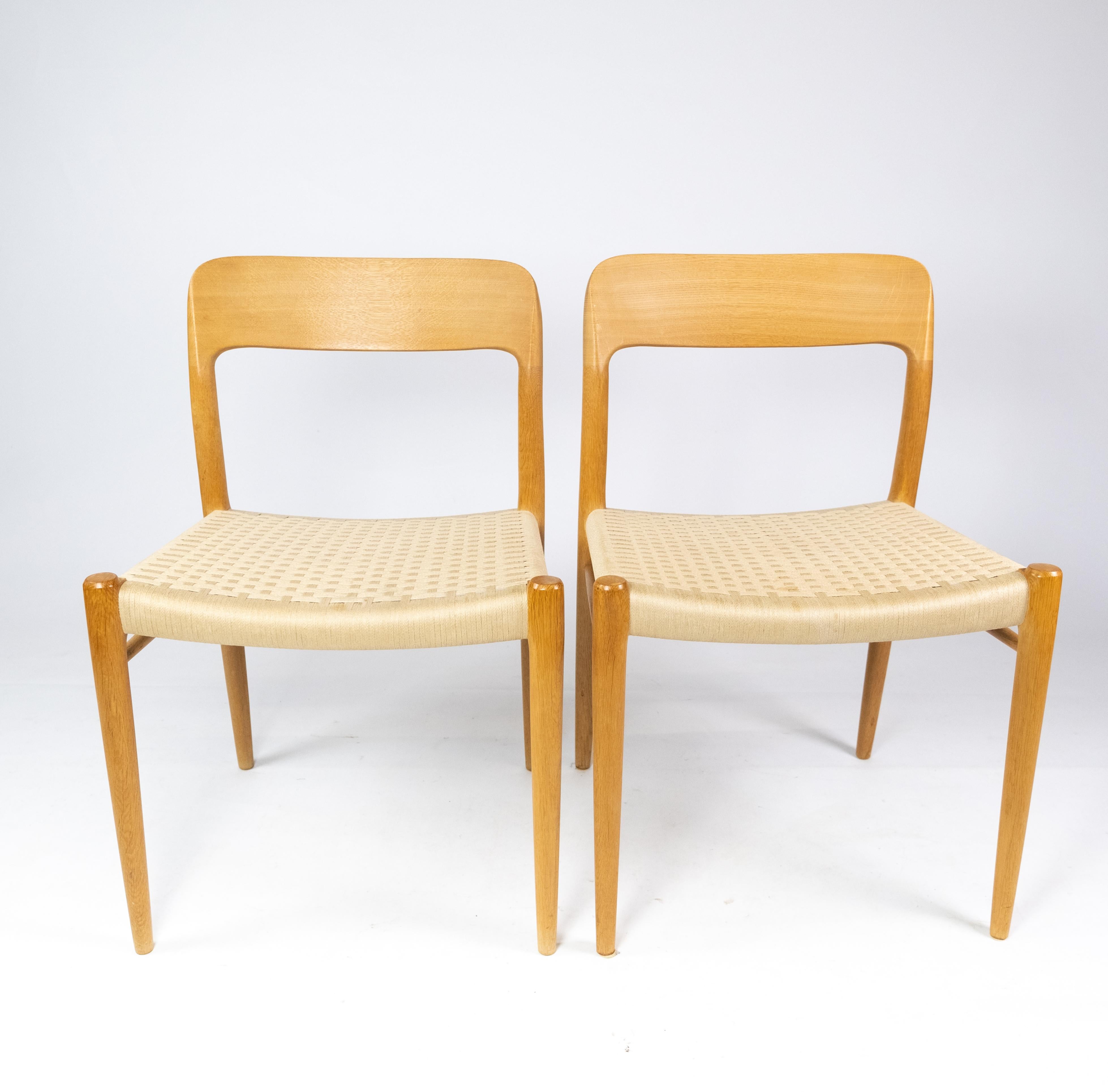 Scandinavian Modern Set of Four Dining Chairs, Model 75, in Oak and Papercord by N.O. Møller