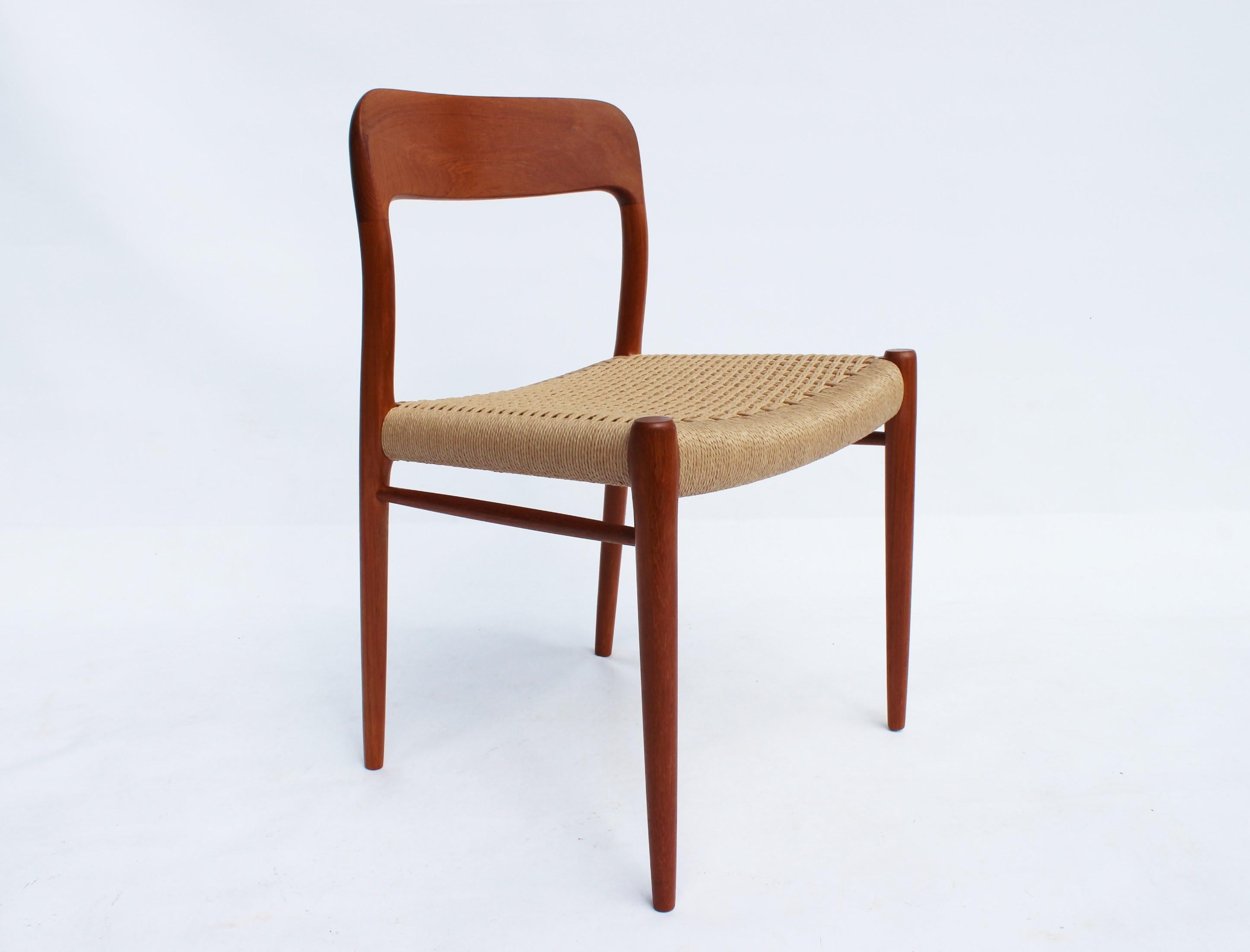 A set of four dining chairs, model 75, in teak and papercord designed by N.O. Møller from the 1960s. The chairs are in great vintage condition.
