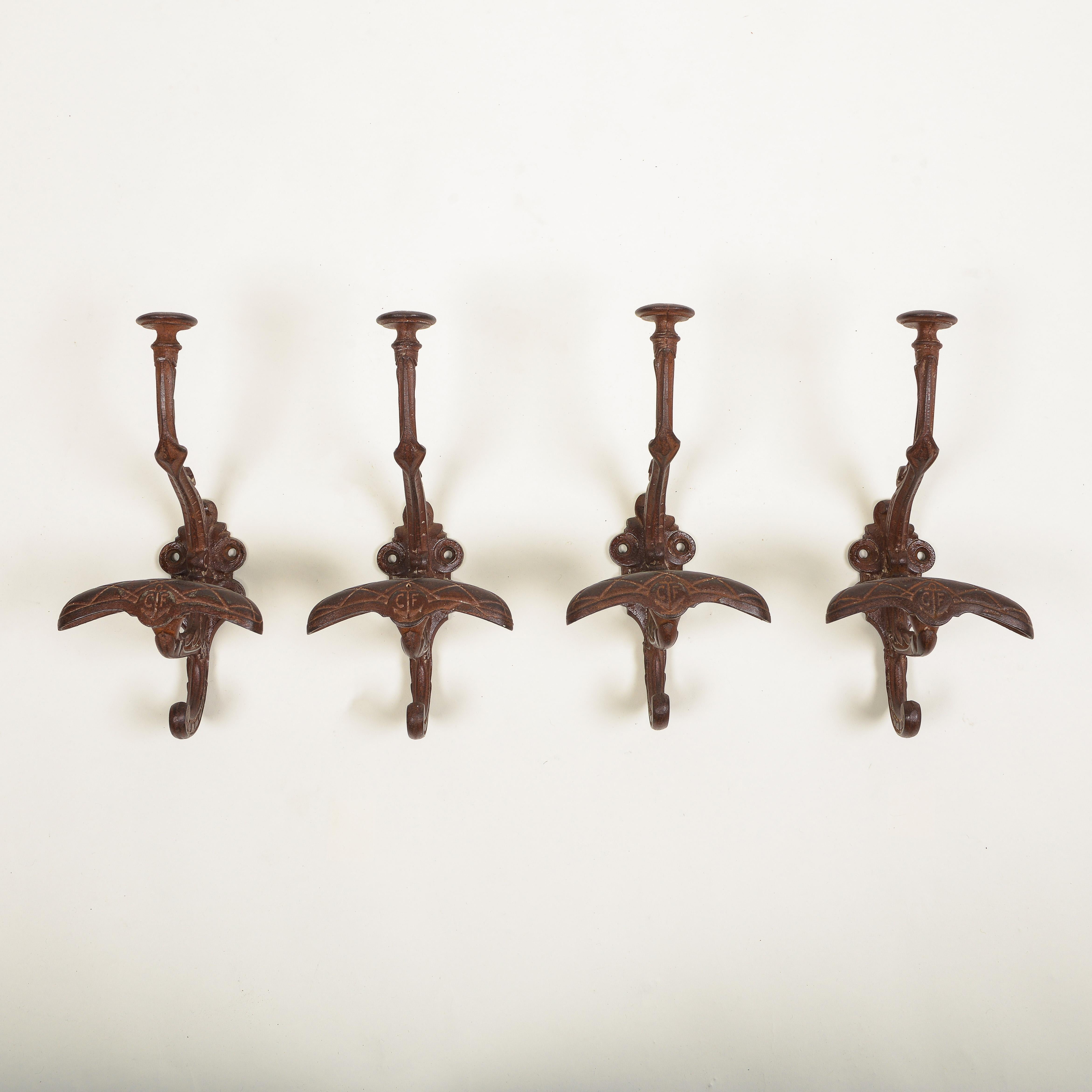 Each with a hook in the form of an anchor initialed 