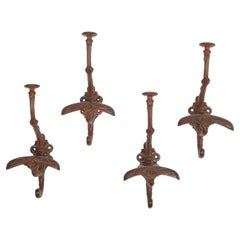 Antique Set of Four English Cast Iron Hat and Coat Hooks