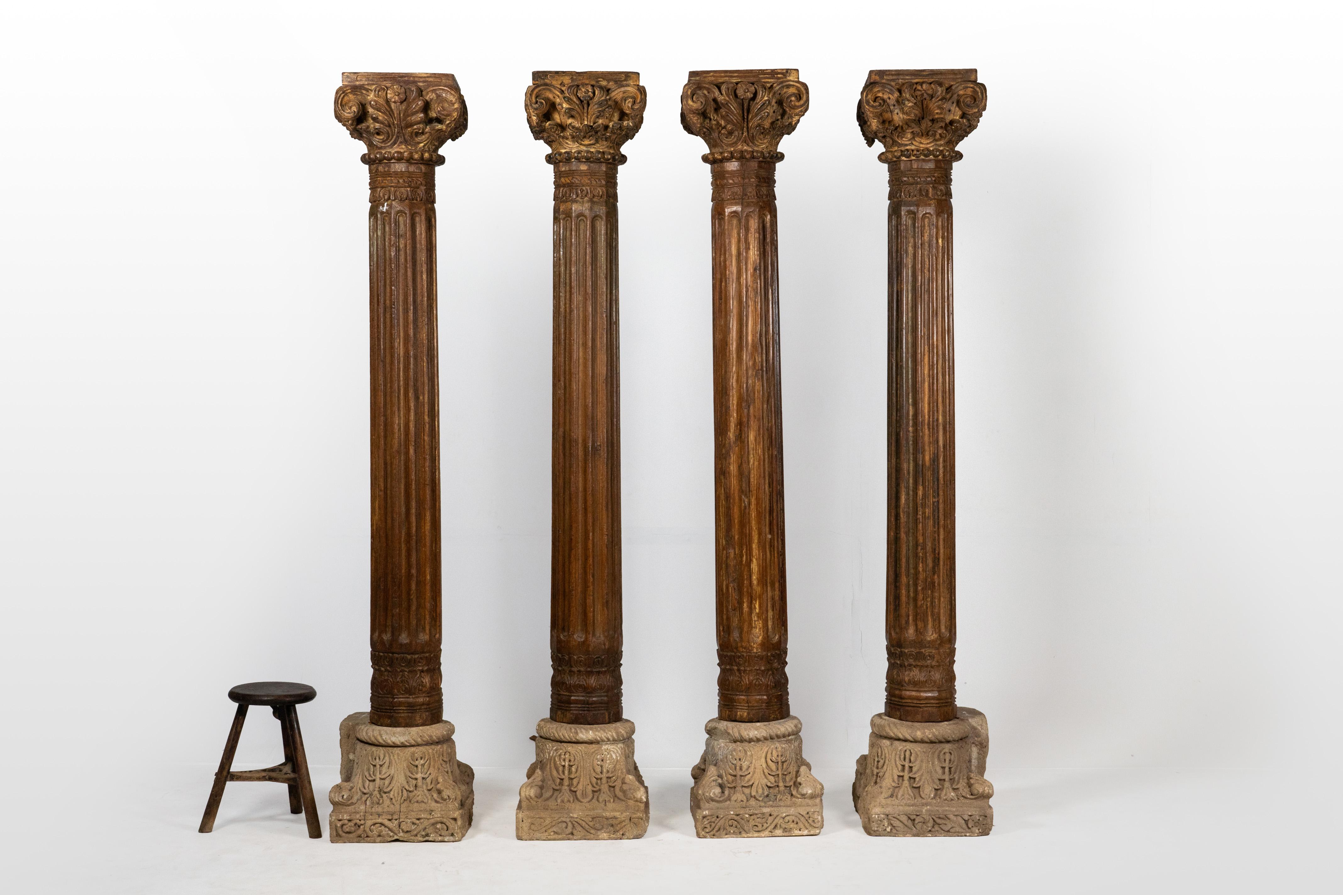 A Set of Four European-Inspired Wooden Columns 4